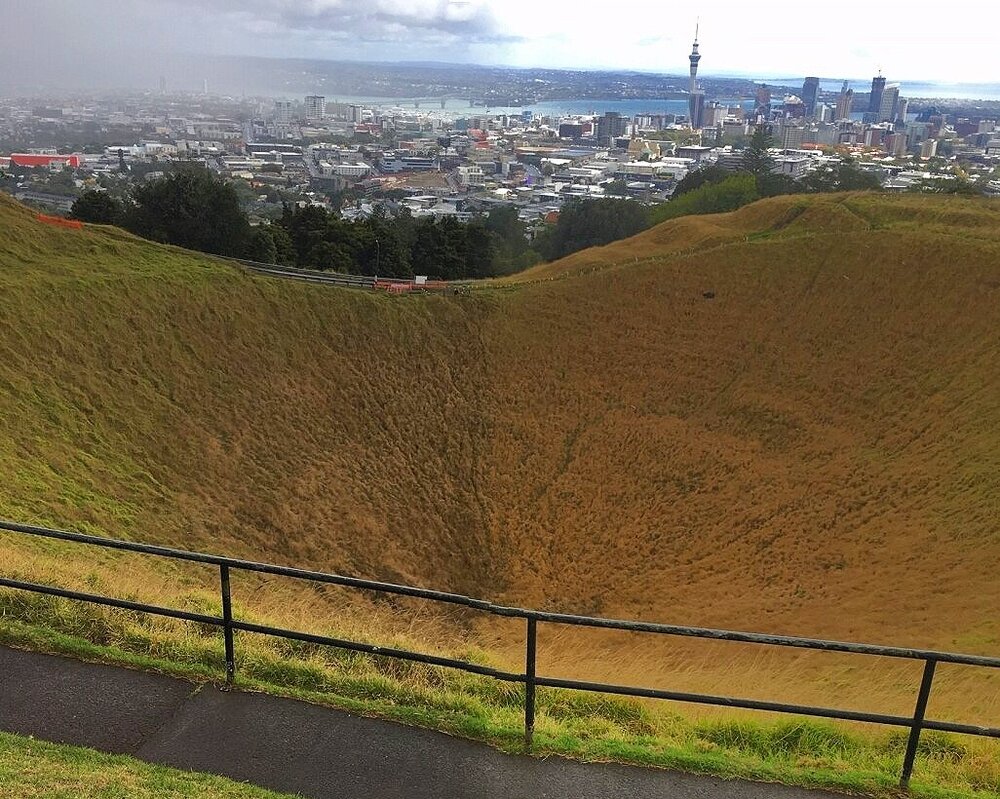 Views of Auckland, New Zealand and Mount Eden crater from Mount Eden hiking trail