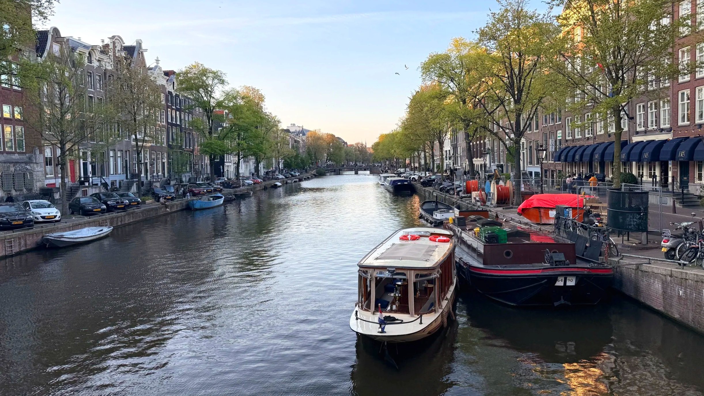 A wide canal in Amsterdam provides one of the best things to see in the city