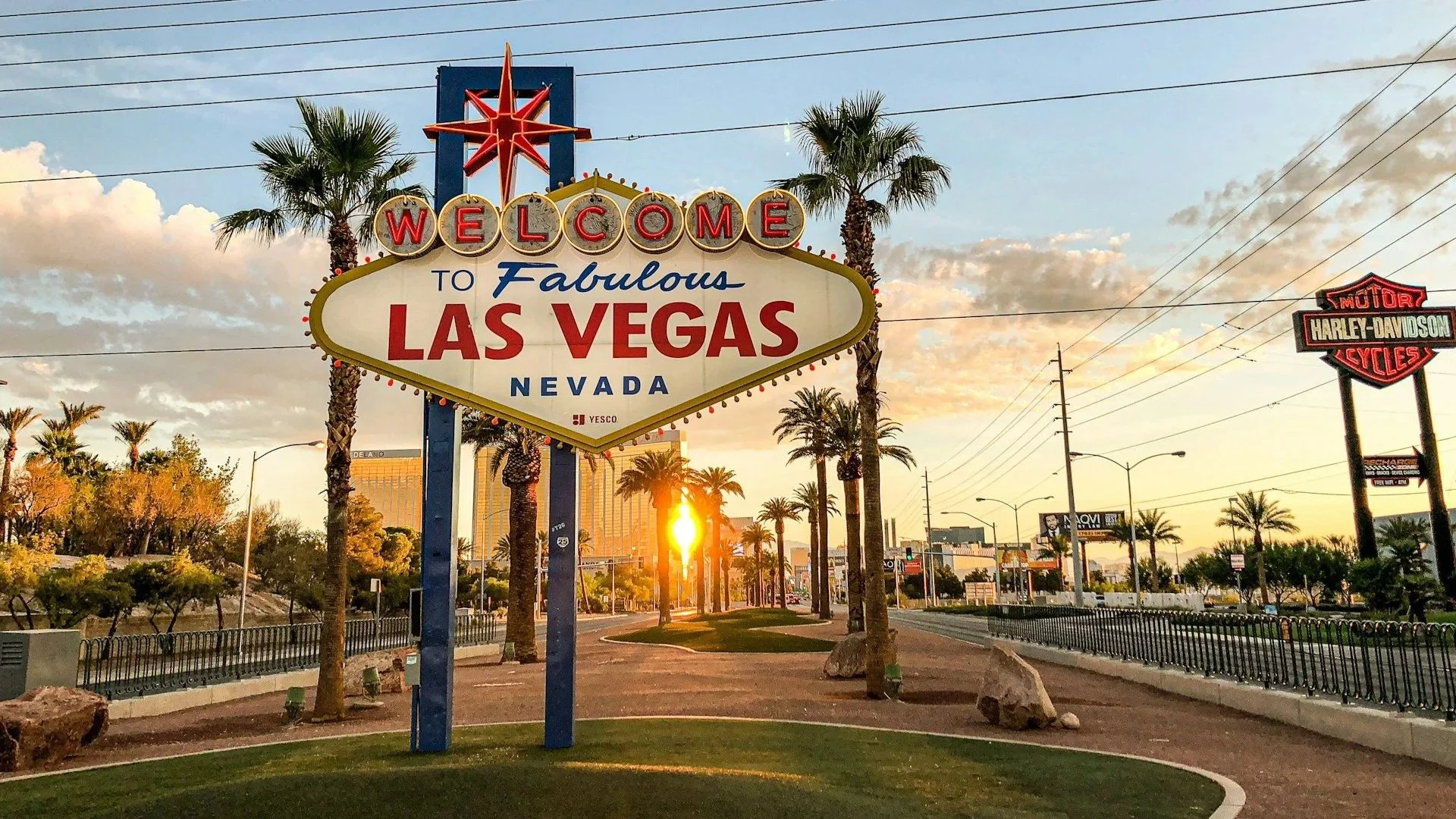 Welcome to fabulous Las Vegas sign with the sun setting in the background