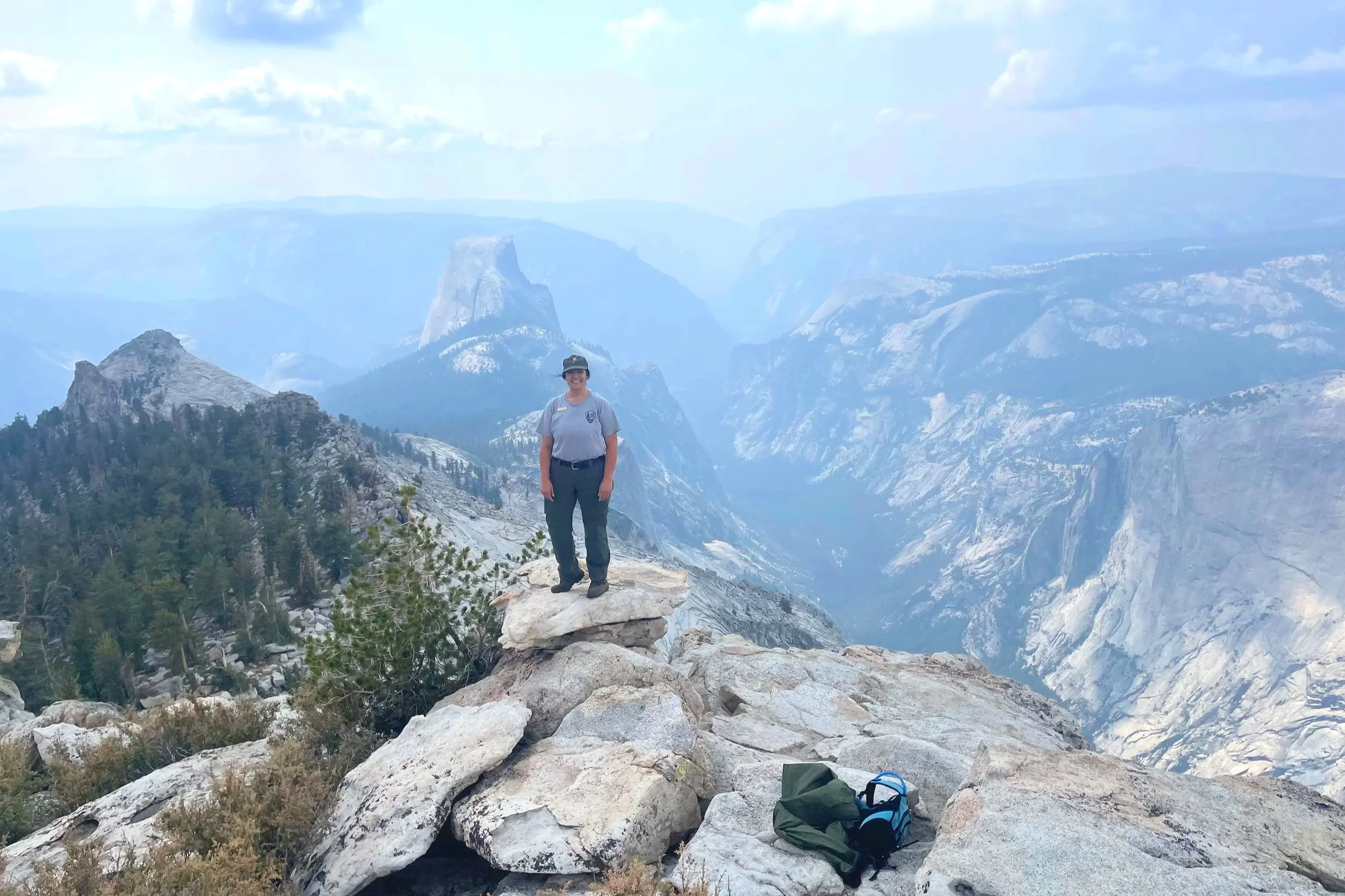 The top of Clouds Rest with a view of Half Dome and Yosemite Valley below