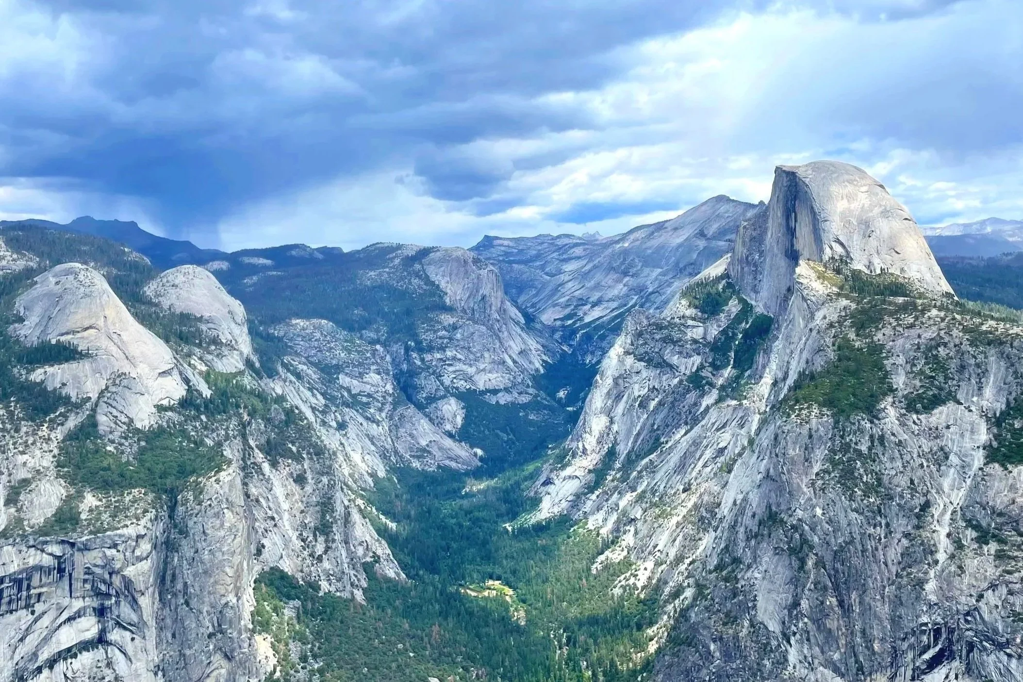 The view of Yosemite Valley, including Half Dome, from Glacier Point