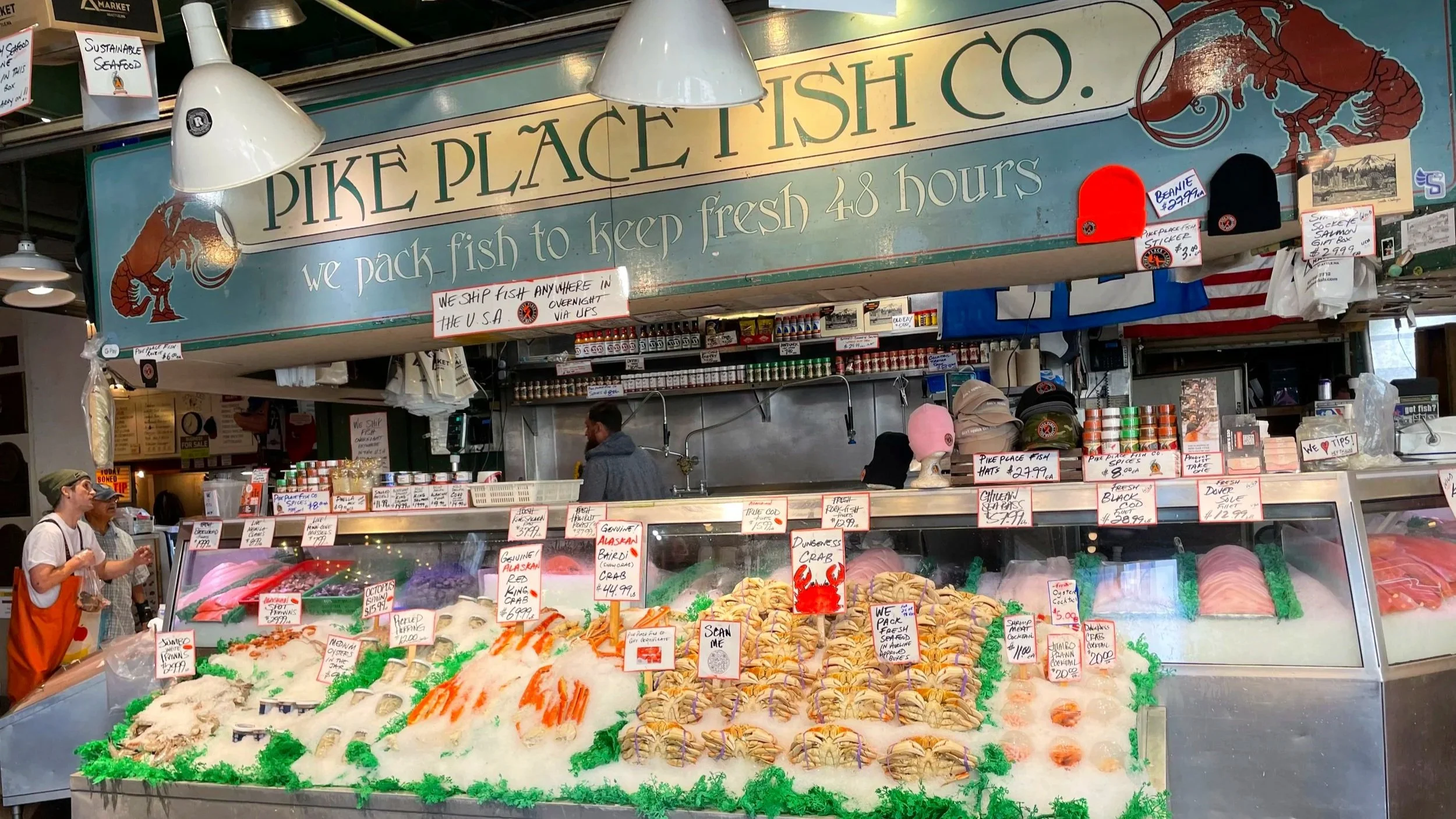 Fish market selling fresh seafood at Pike Place.