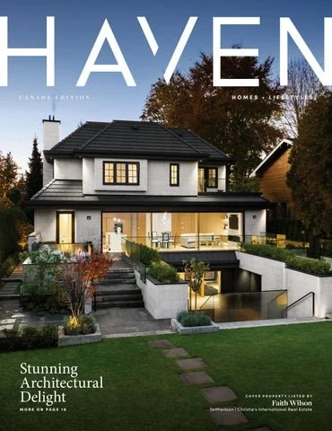 Cover of a magazine titled 'Haven' featuring a modern house in a lush yard during dusk with trees in the background.
