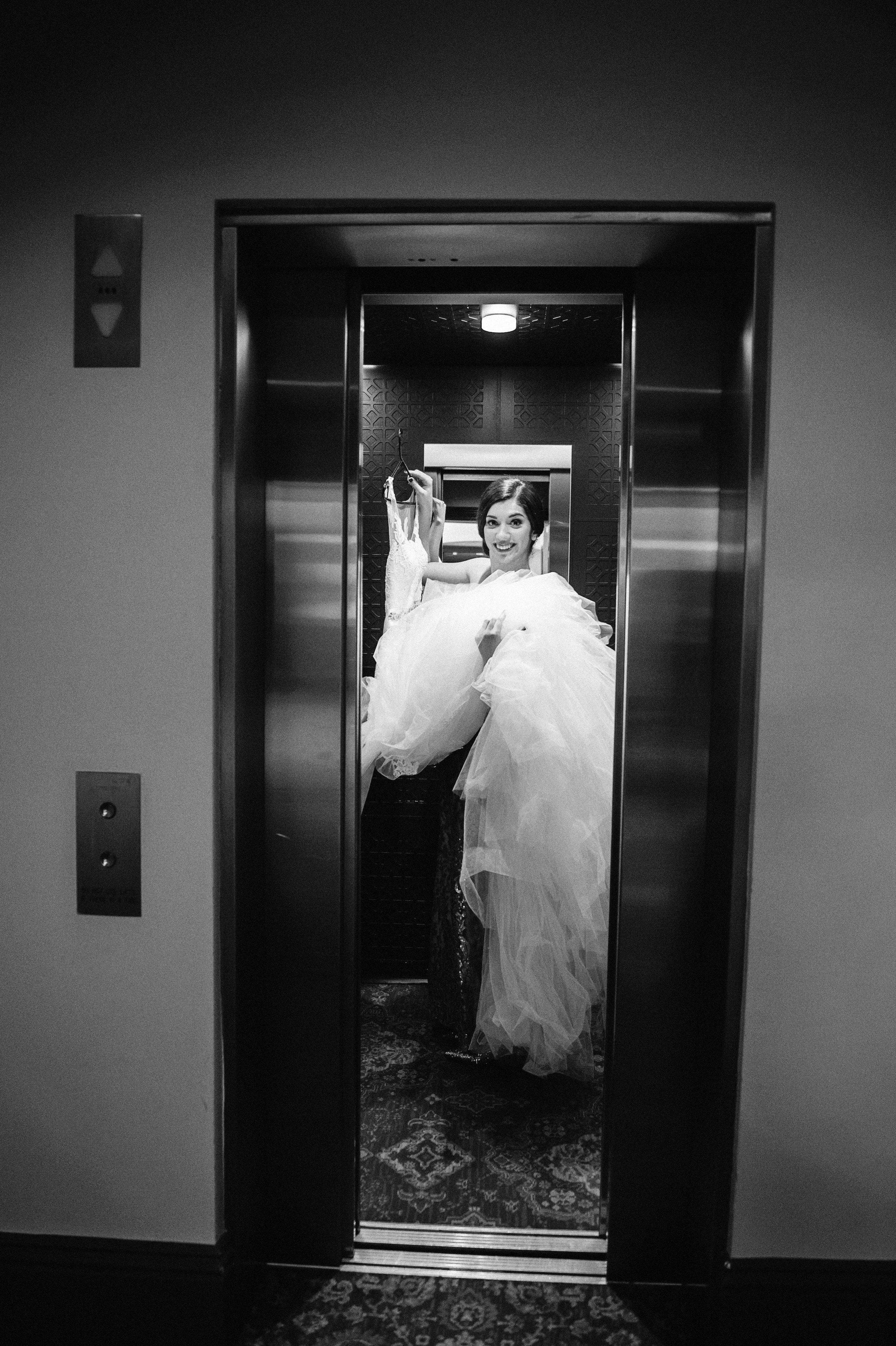 Getting ready for their wedding at Hadley's Orient Hotel