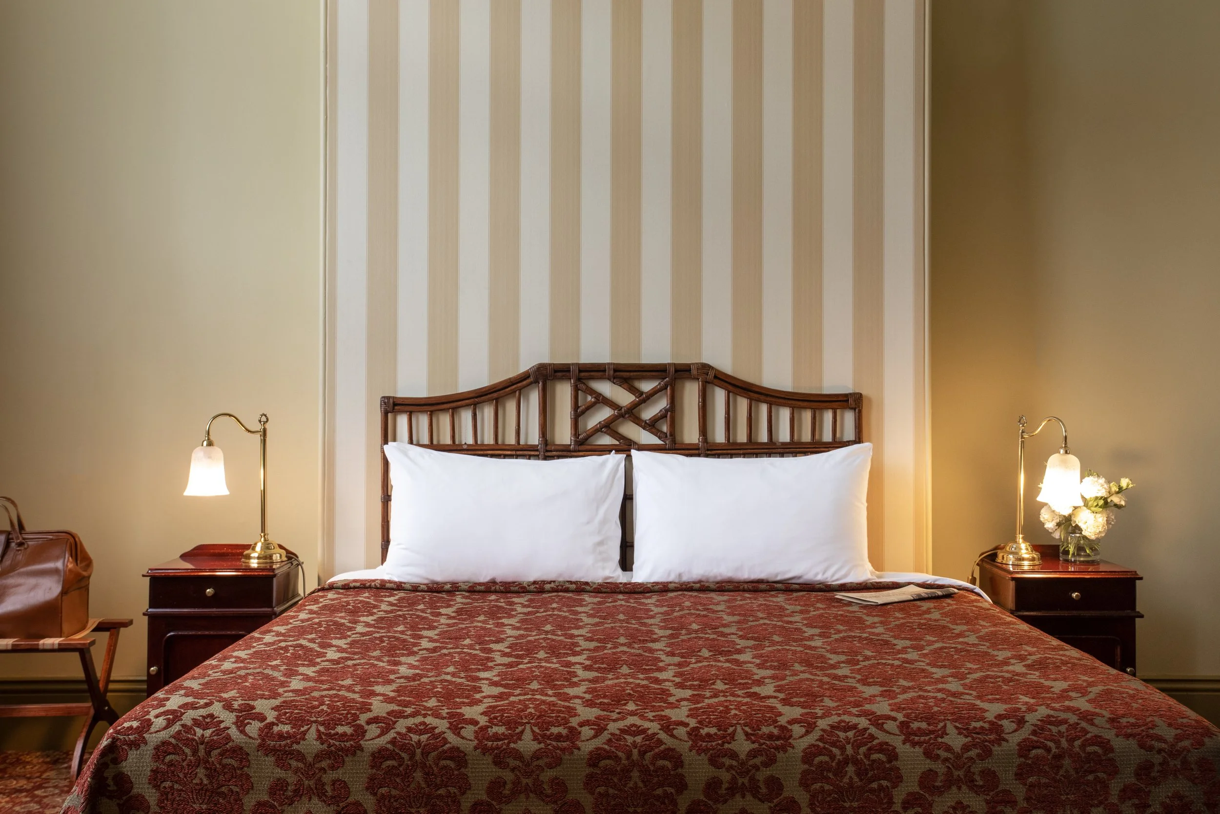 Large, comfortable bed inside a suite at Hadley's