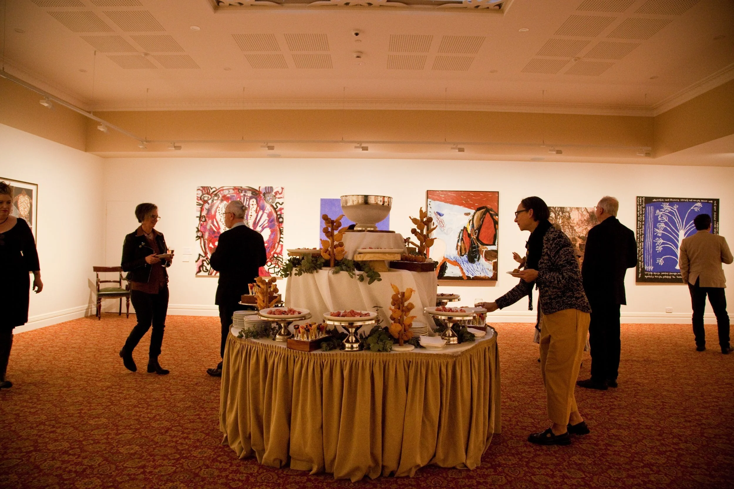 An audience for a private event inside Hadley's Art Prize gallery at Hadley's in Hobart
