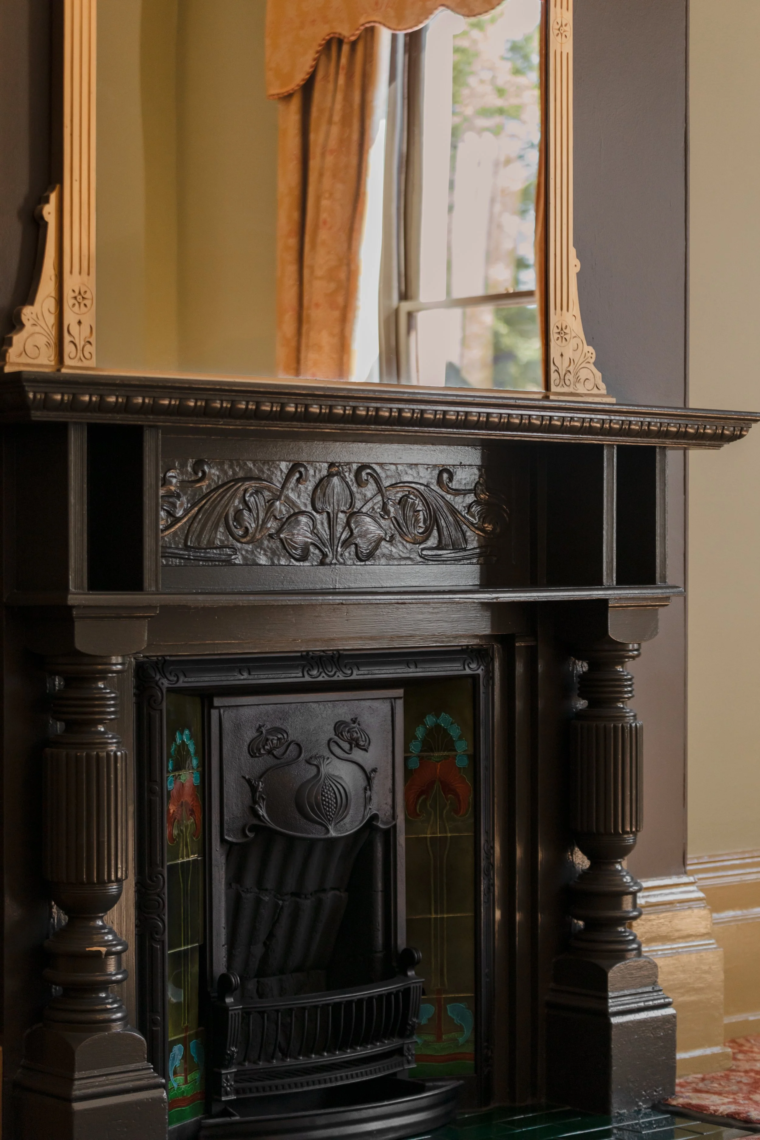 Golden mirrors and delicate fireplaces at Hadley's in Hobart