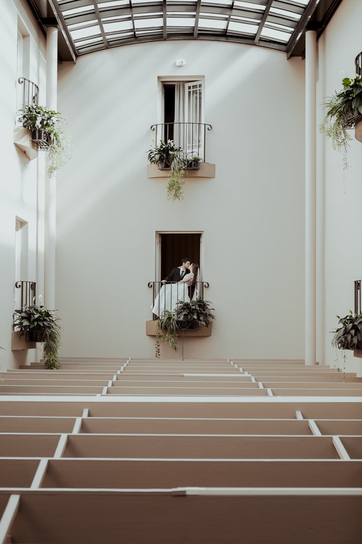 Bride and groom celebrating their marriage inside the Atrium at Hadley's in Hobart