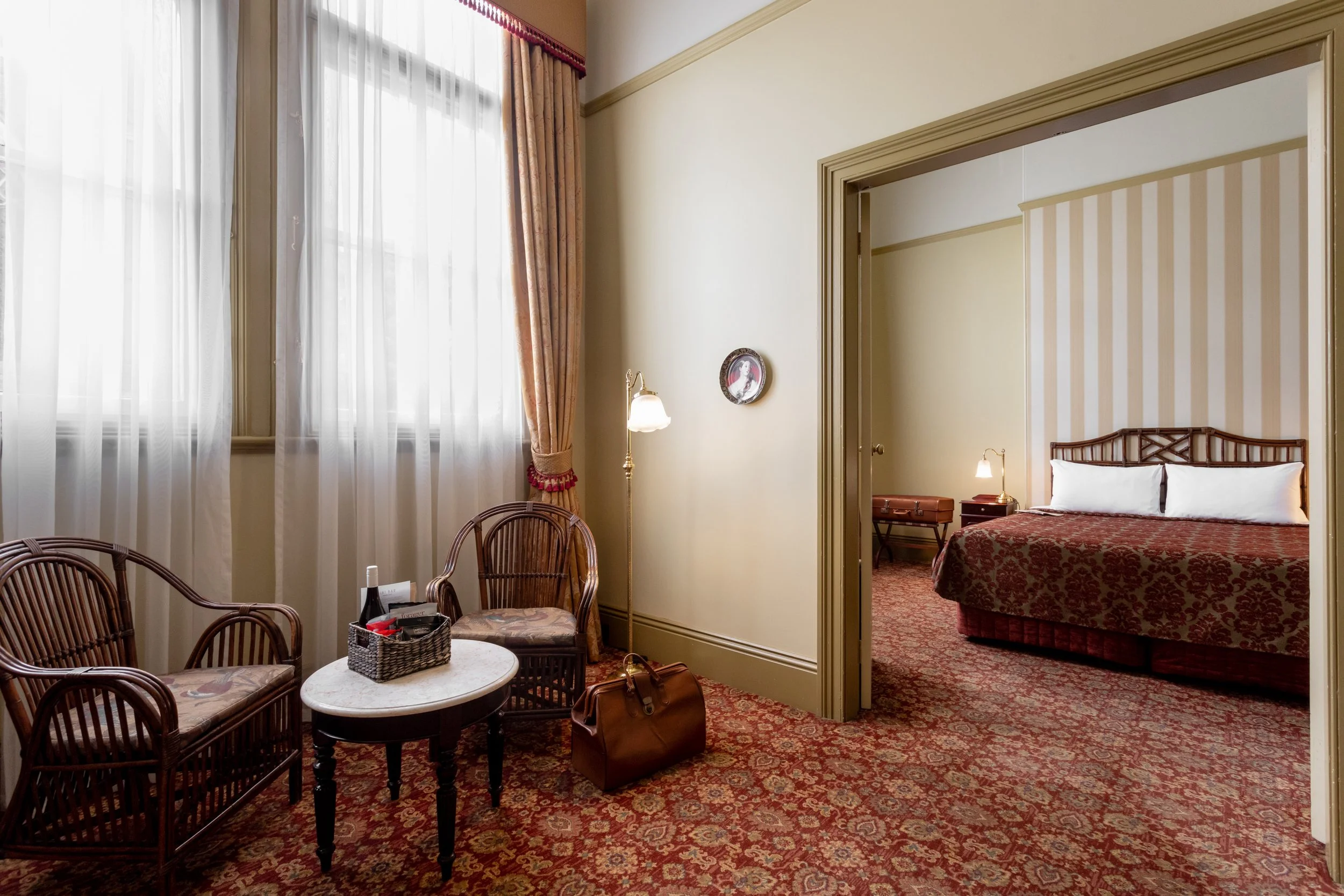 Large Victorian Suite and sitting area with windows overlooking Murray Street in Hobart