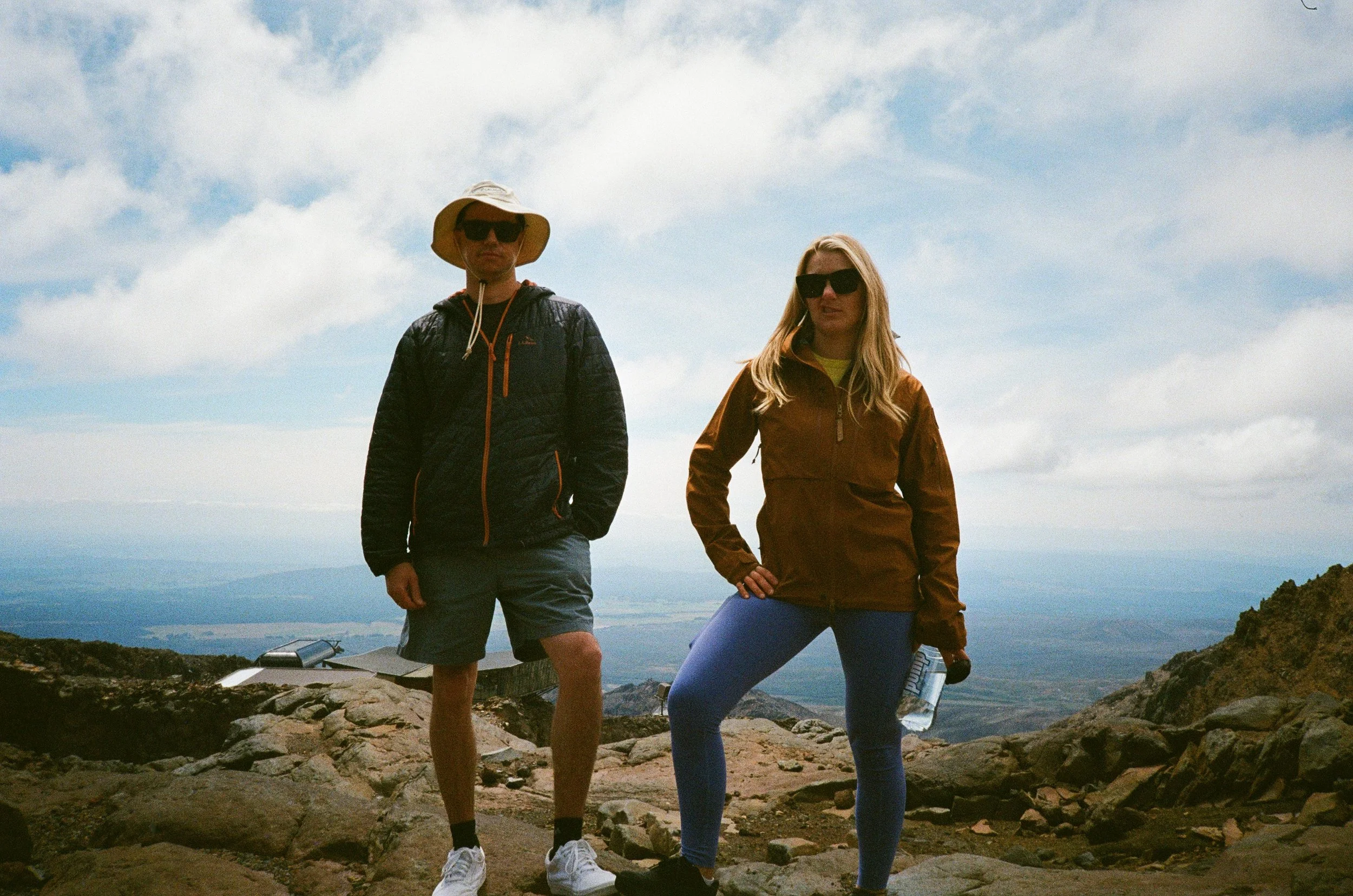 (Tongariro National Park) - at the Whakapapa ski area. Took a ride up to the top and hiked a bit on the rocks. Max and Marieta at the top.