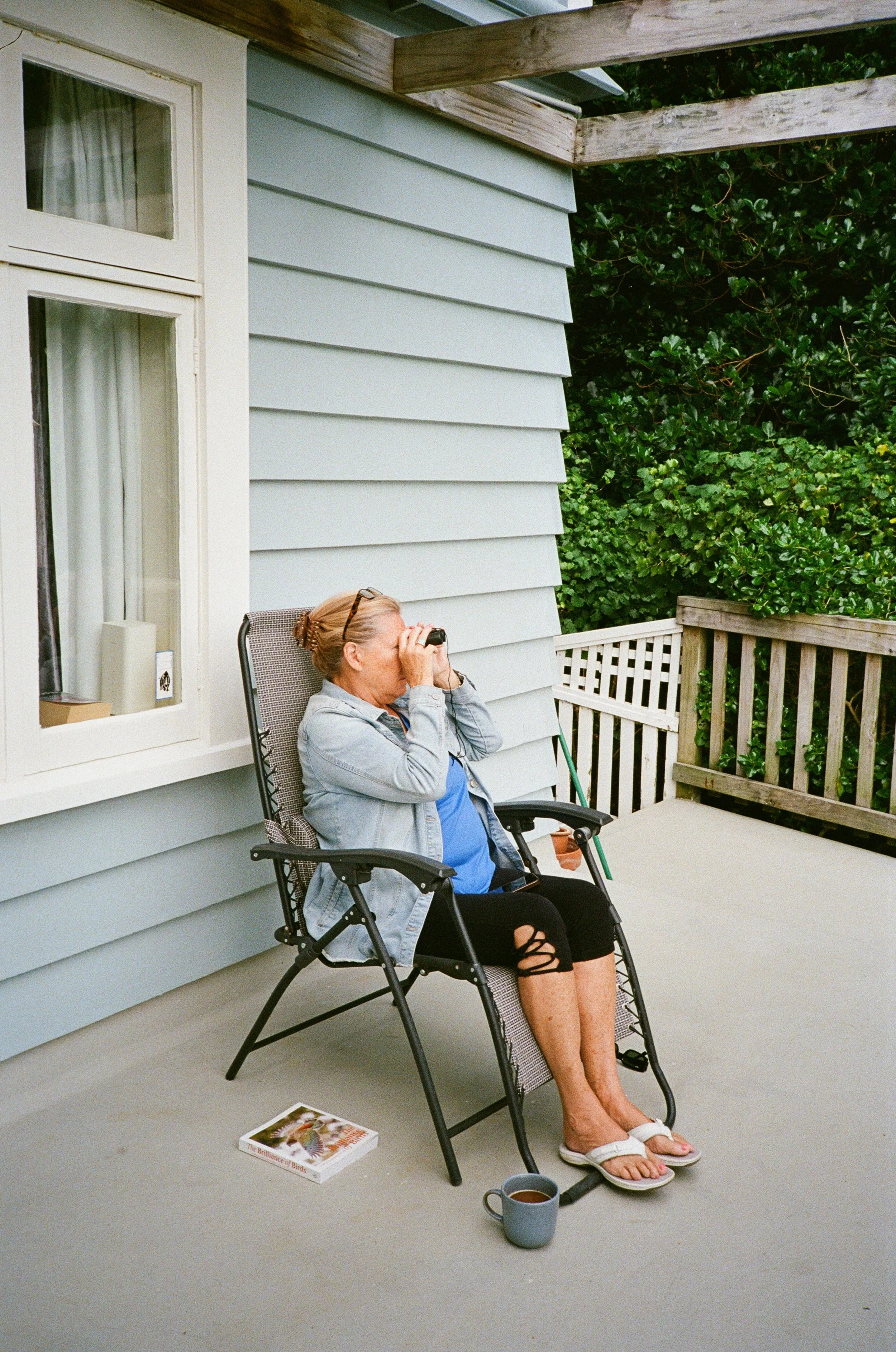 (Wellington) - Mom birding from Christina and Robbie's porch.