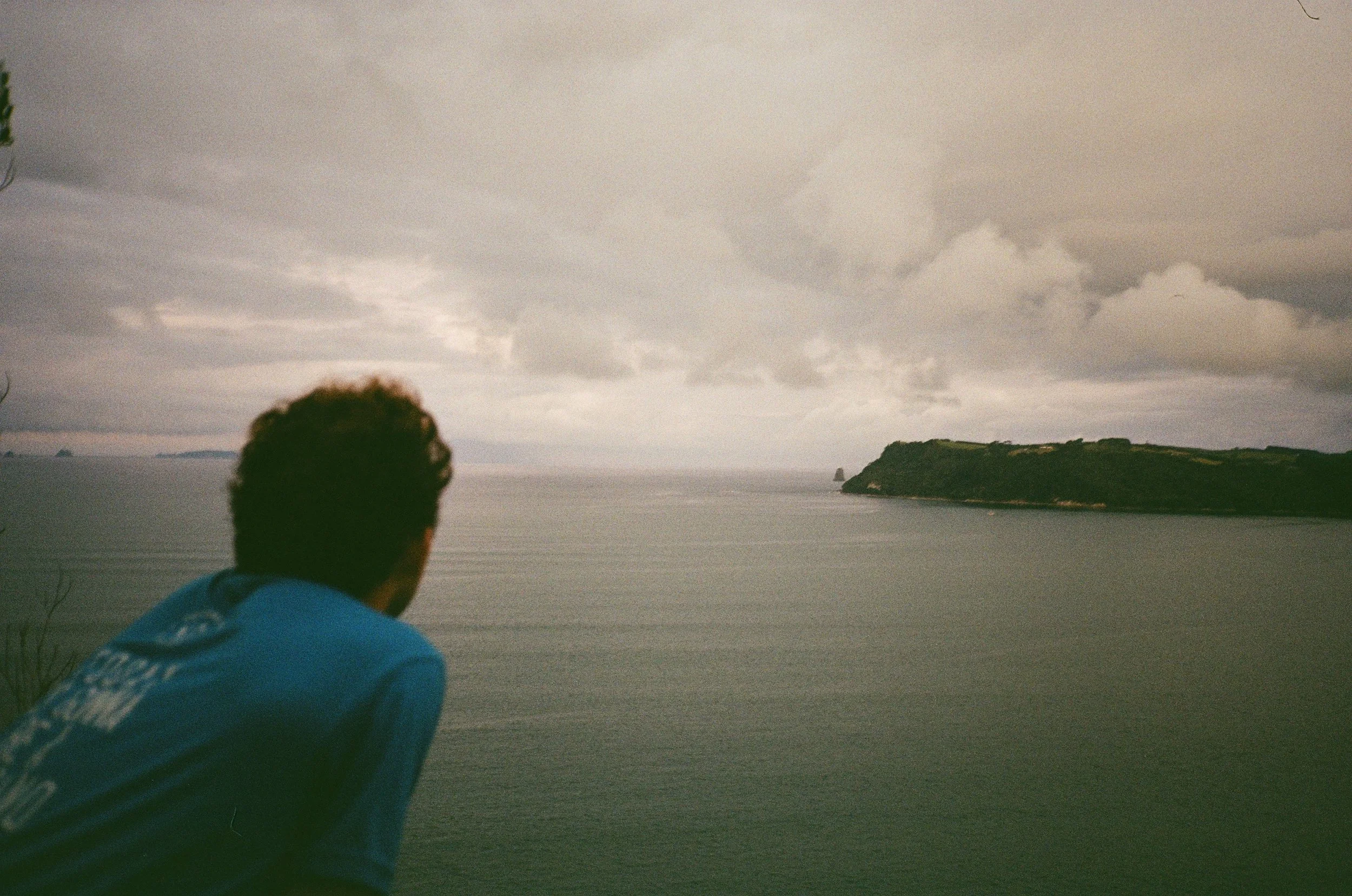 (Cooks Beach) - Drove up to a lookout point at sunset. In the photo is one of Robbie's friends Max that lived around there.