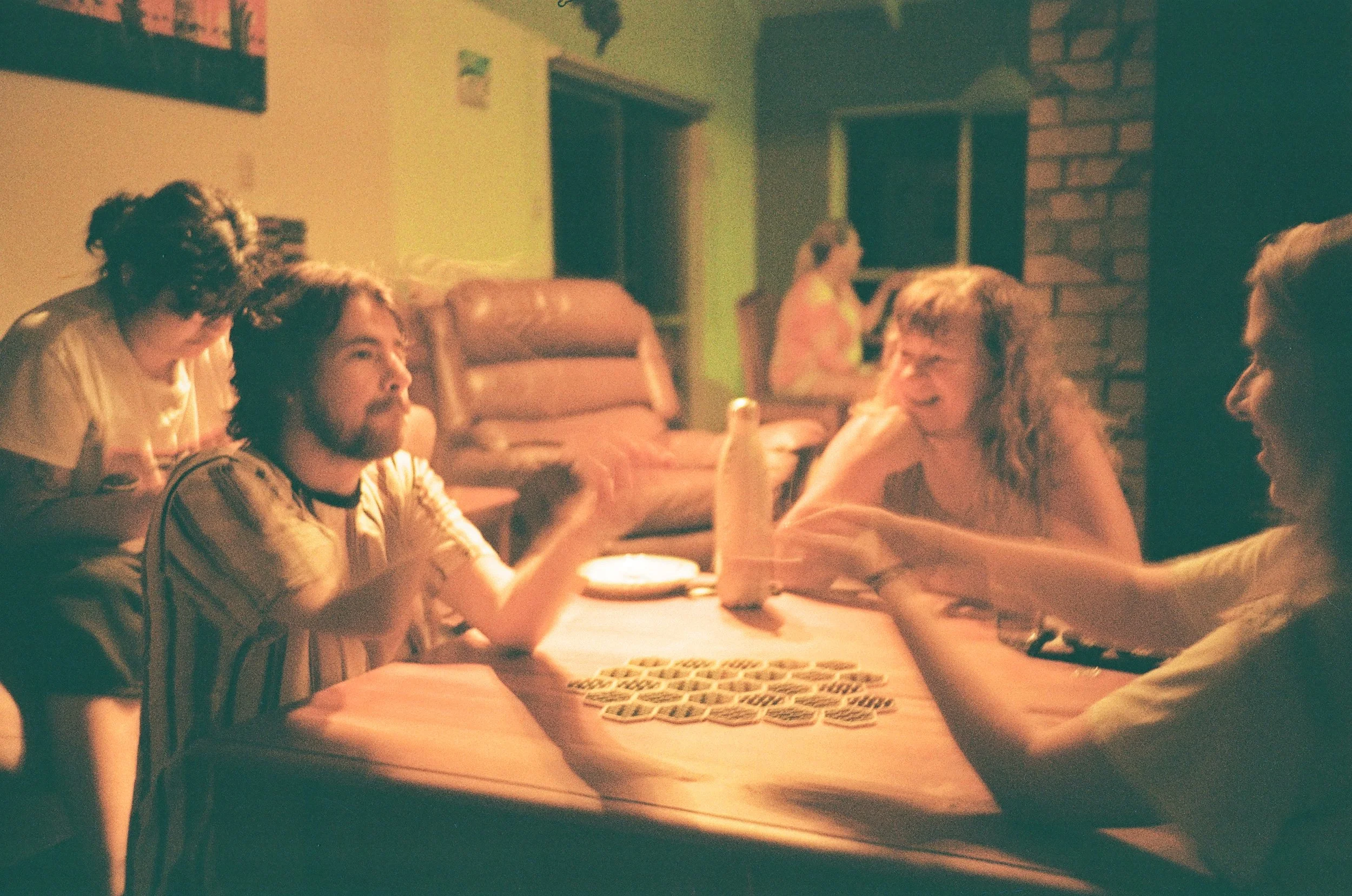 (Cooks Beach) - our first night. Christina playing Robbie's brother (Michael) in an extremely competitive memory game. We stepped into a tournament of the O'hara's to see who had the best memory. (Christina won)