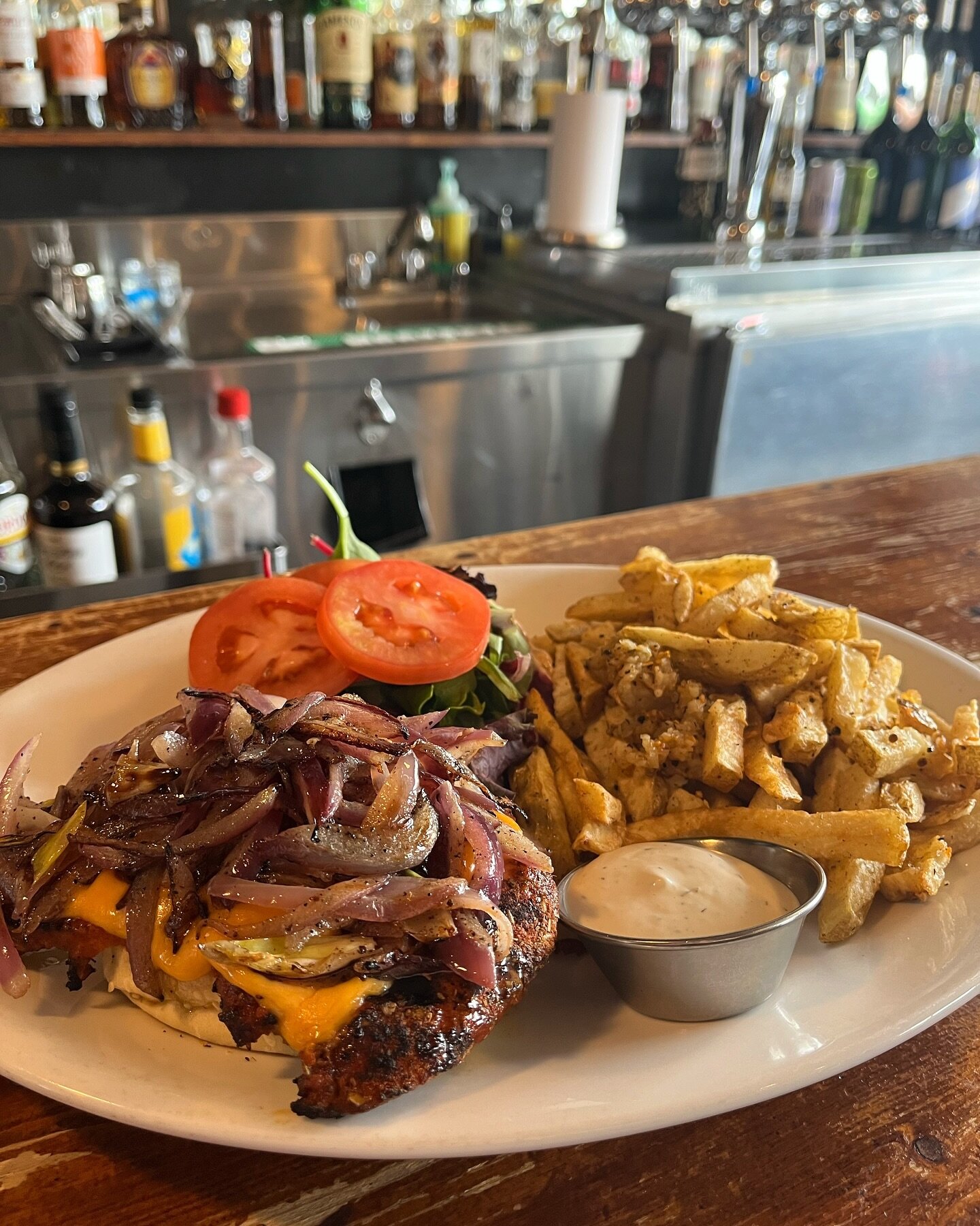 Cliff and Ed&rsquo;s Blackened Cajun Chicken Burger🍔 
~ this customer added saut&eacute;ed onions and cheddar cheese, and upgraded their fries to garlic-style with house-made ranch to dip ~
