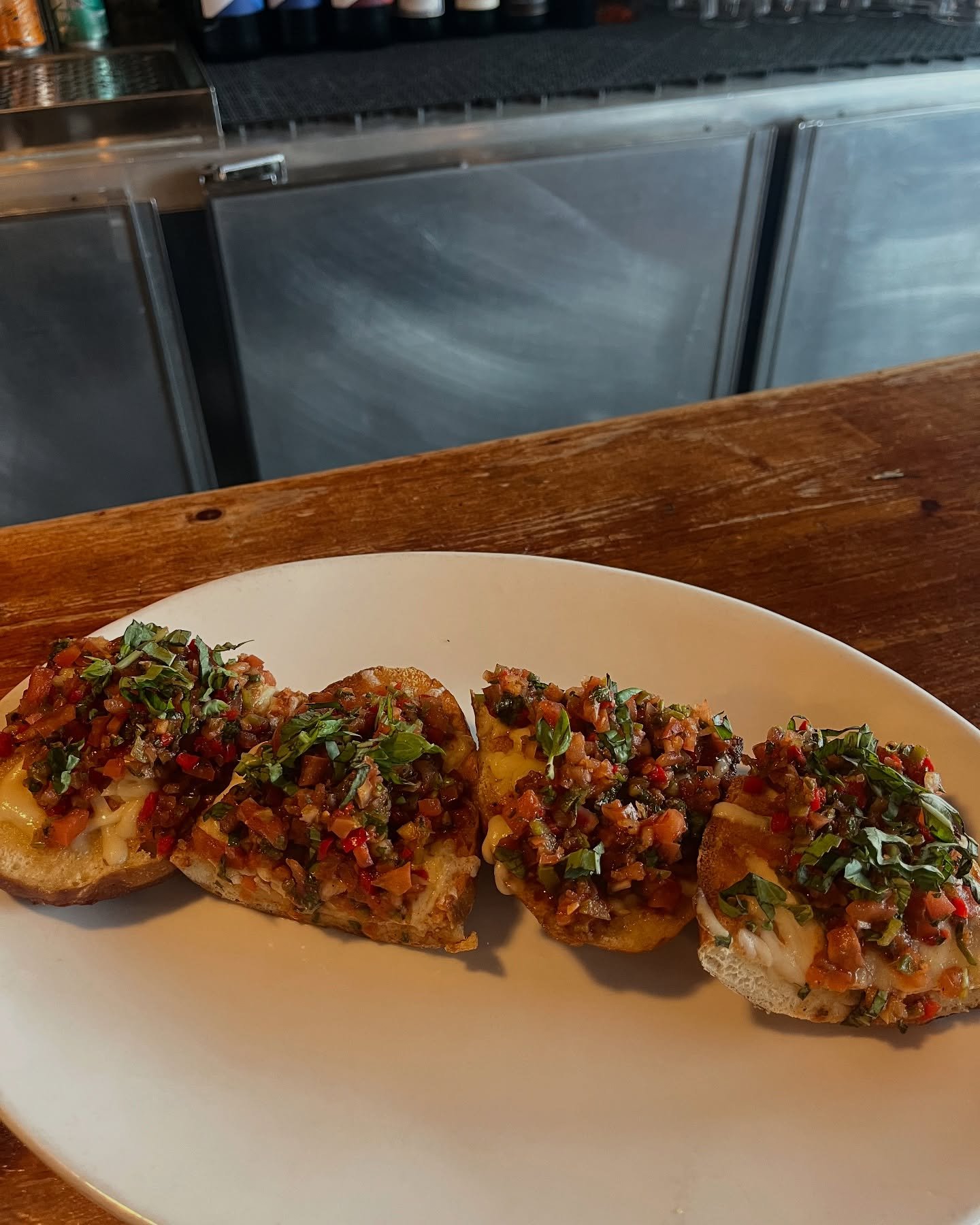 Feature Appetizer: Cheesy Pretzel Bun Bruschetta 🍅
Melty Swiss broiled on our infamous pretzel bun, topped with Tipper salsa and fresh basil. 
Don&rsquo;t knock it till you try it! This yummy appetizer is available during happy hour for just $13.00.