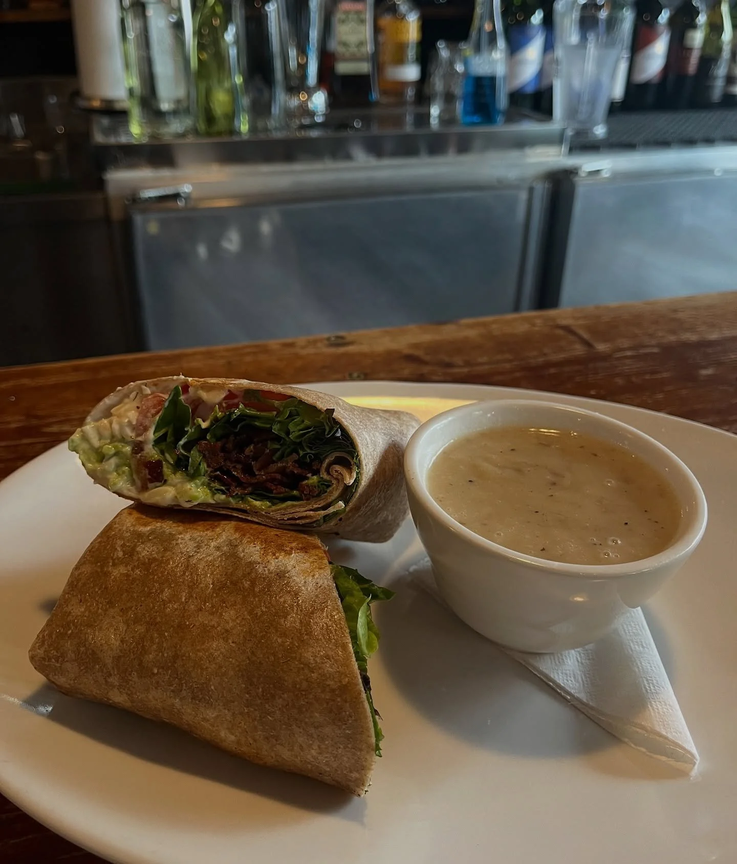 Happy Thursday! Today’s post features our Bacon Wrap! Peppered bacon, avocado, house-ranch, Swiss cheese, tomato, and spring mix snuggled in a whole wheat tortilla. Served with fries or salad, but upgrading to soup is always recommended on a co