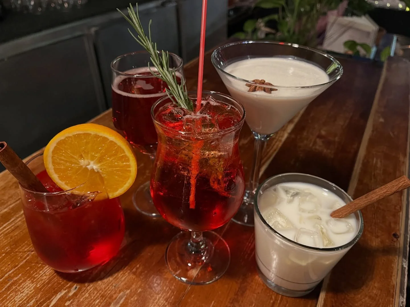 SEASONAL DRINKS are abundant at the Tipper this year! From left to right: 
* Non-alc holiday punch 
* Poinsettia 
* Cranberry Fizz
* Dirty Chai Martini
* Rum &amp; Eggnog