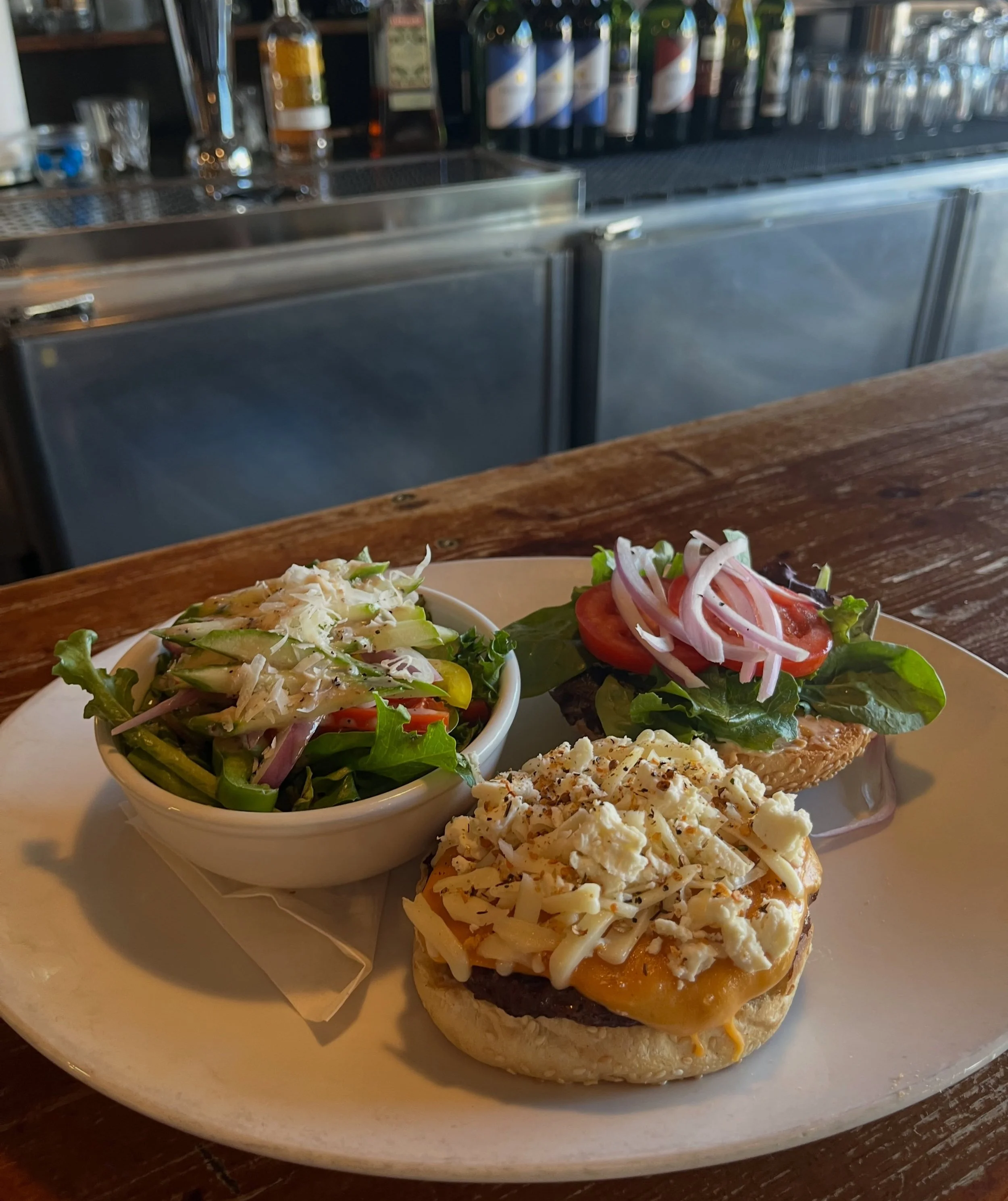 3-Cheese Burger 🍔 a 6oz hand-pressed beef patty topped with melty cheddar, Swiss, and feta.
