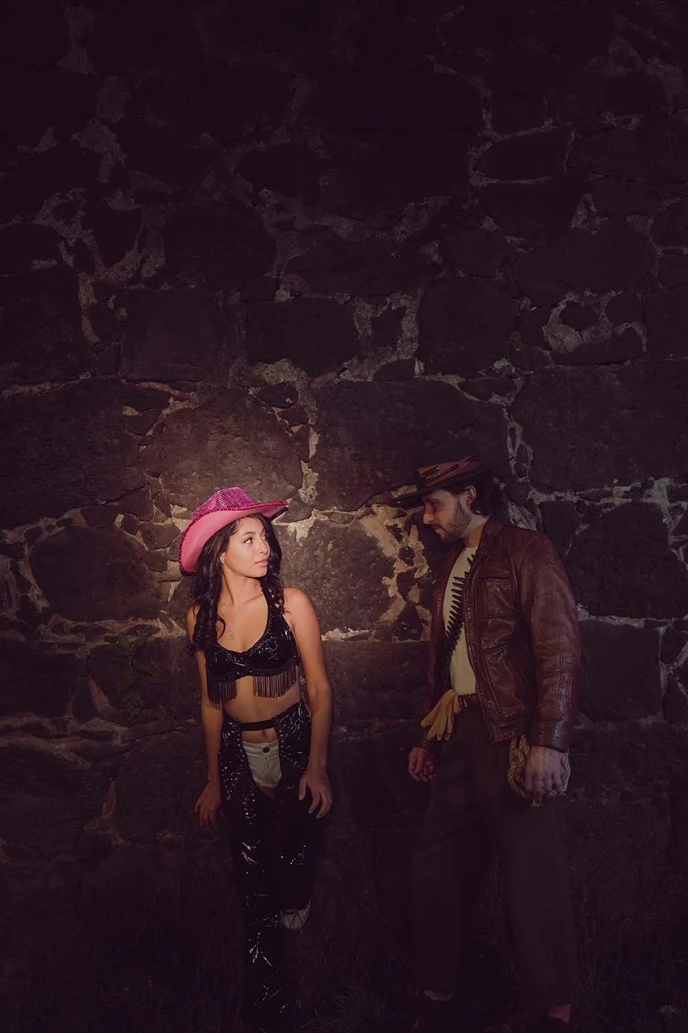 Couple in playful night scene on a cobblestone alley , Coyoacán..jpg