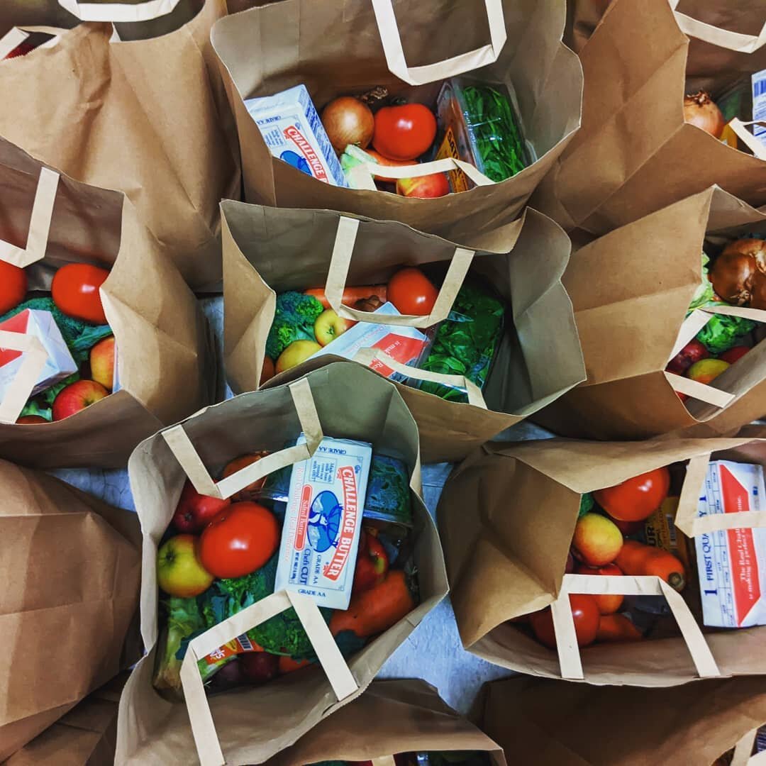 It was such a pleasure and a joy to launch the mutual aid CSA today! You can see us here packing bags full of apples, broccoli, carrots, onions, potatoes, spinach, tomatoes and butter + getting ready for distribution to neighbors. We were able to pro