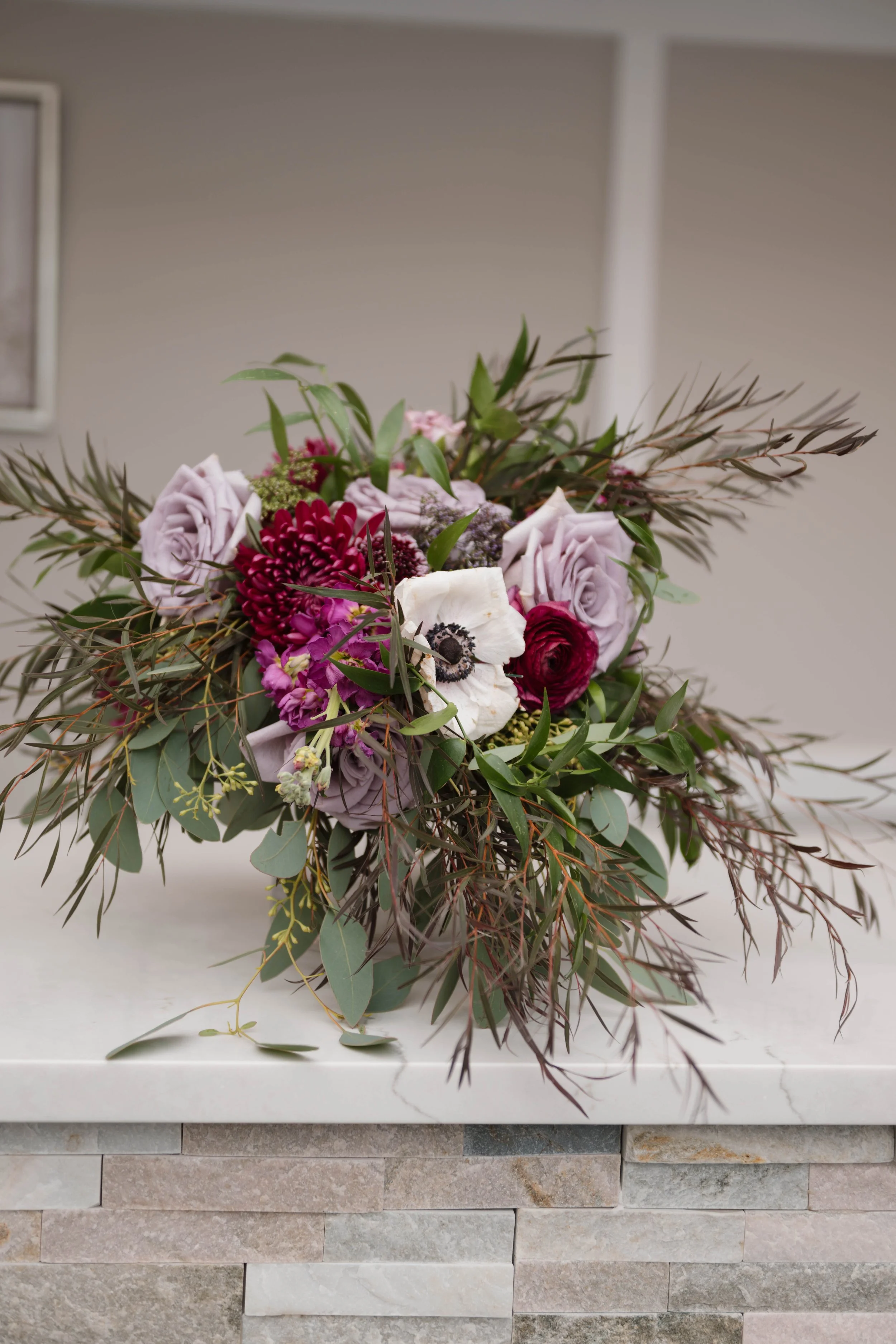 Barefoot Florals at Golden Sands Purple table centerpieces