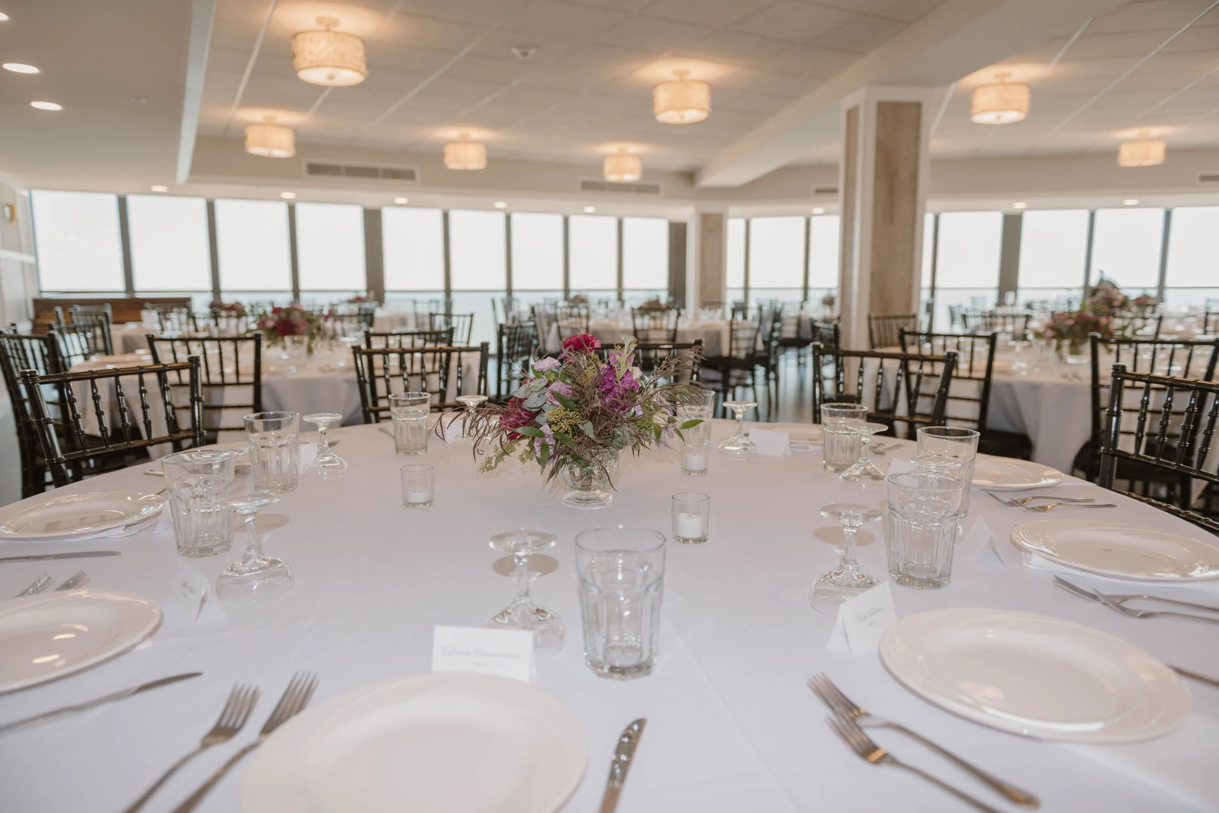 Barefoot Florals at Golden Sands Purple table centerpieces