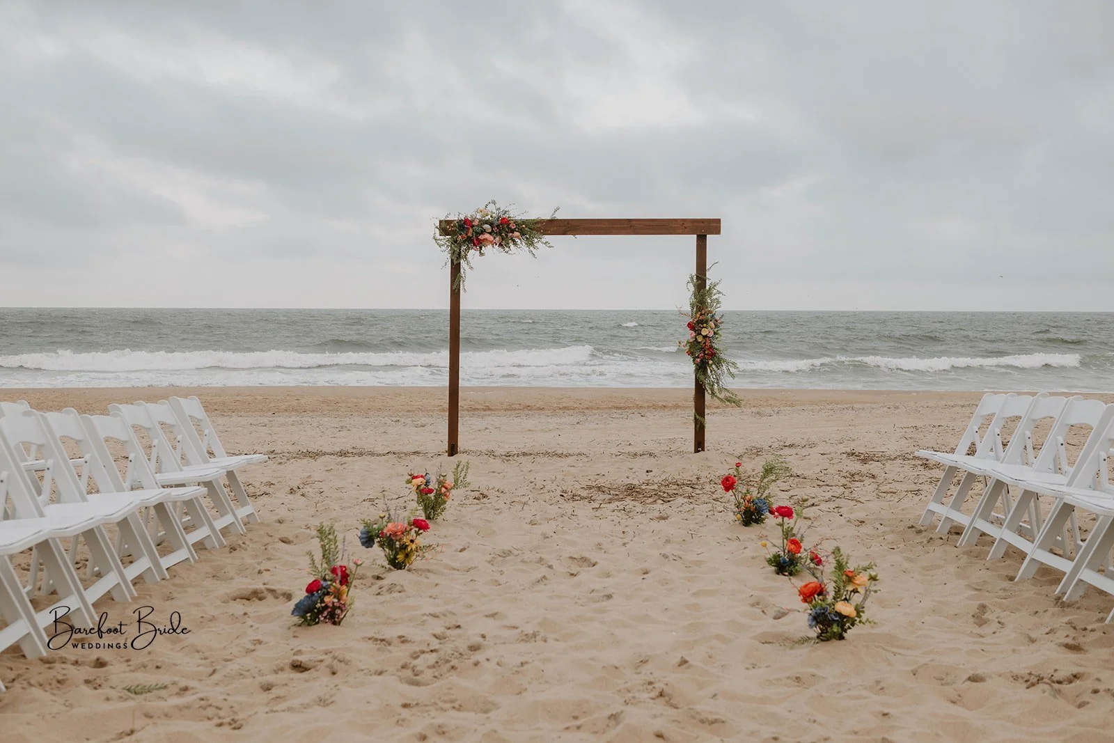 Beach-Wedding-Arbor-Wildflowers-Barefoot-Bride-Weddings
