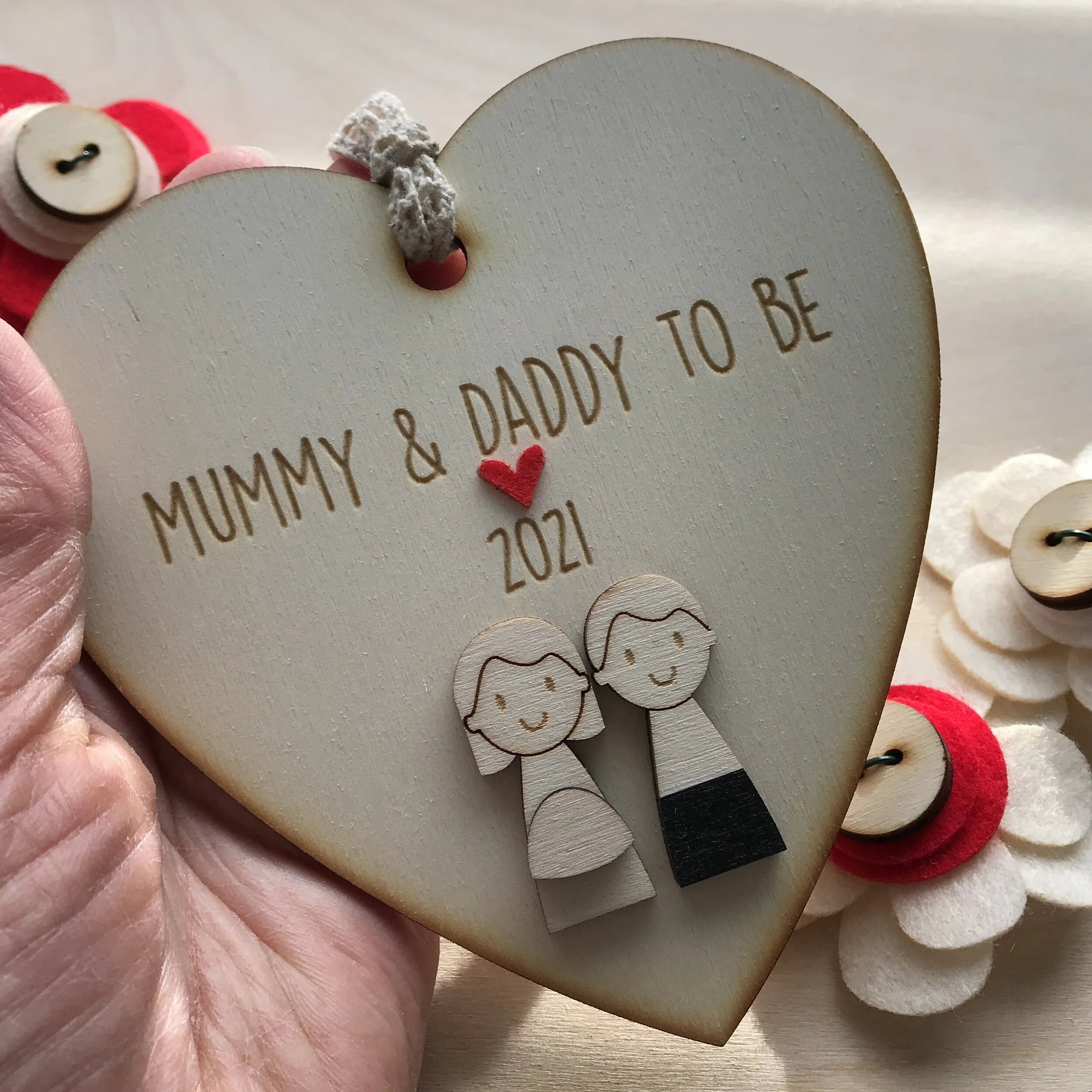 mummy and daddy to be heart in hand.JPG