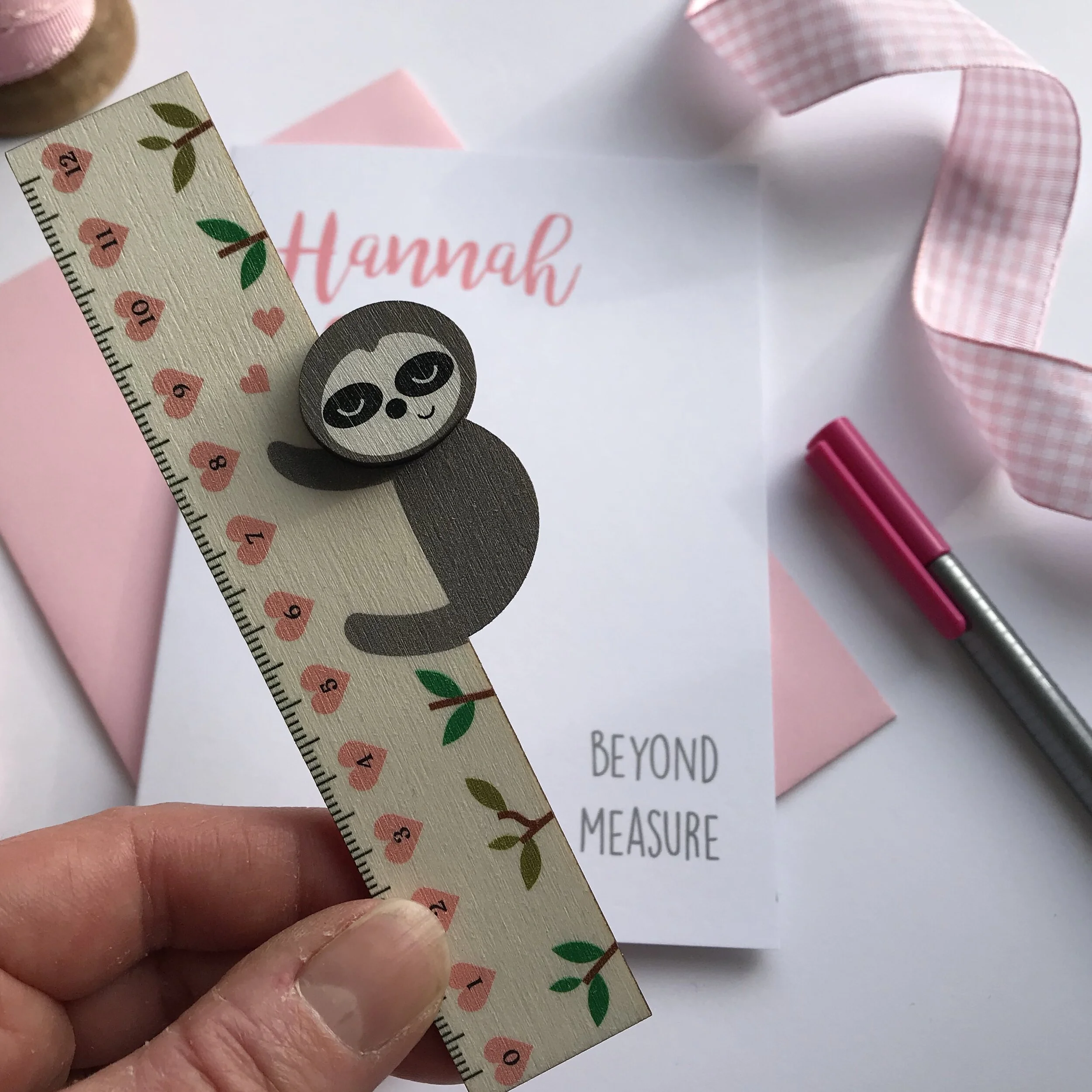 sloth ruler in hand.JPG