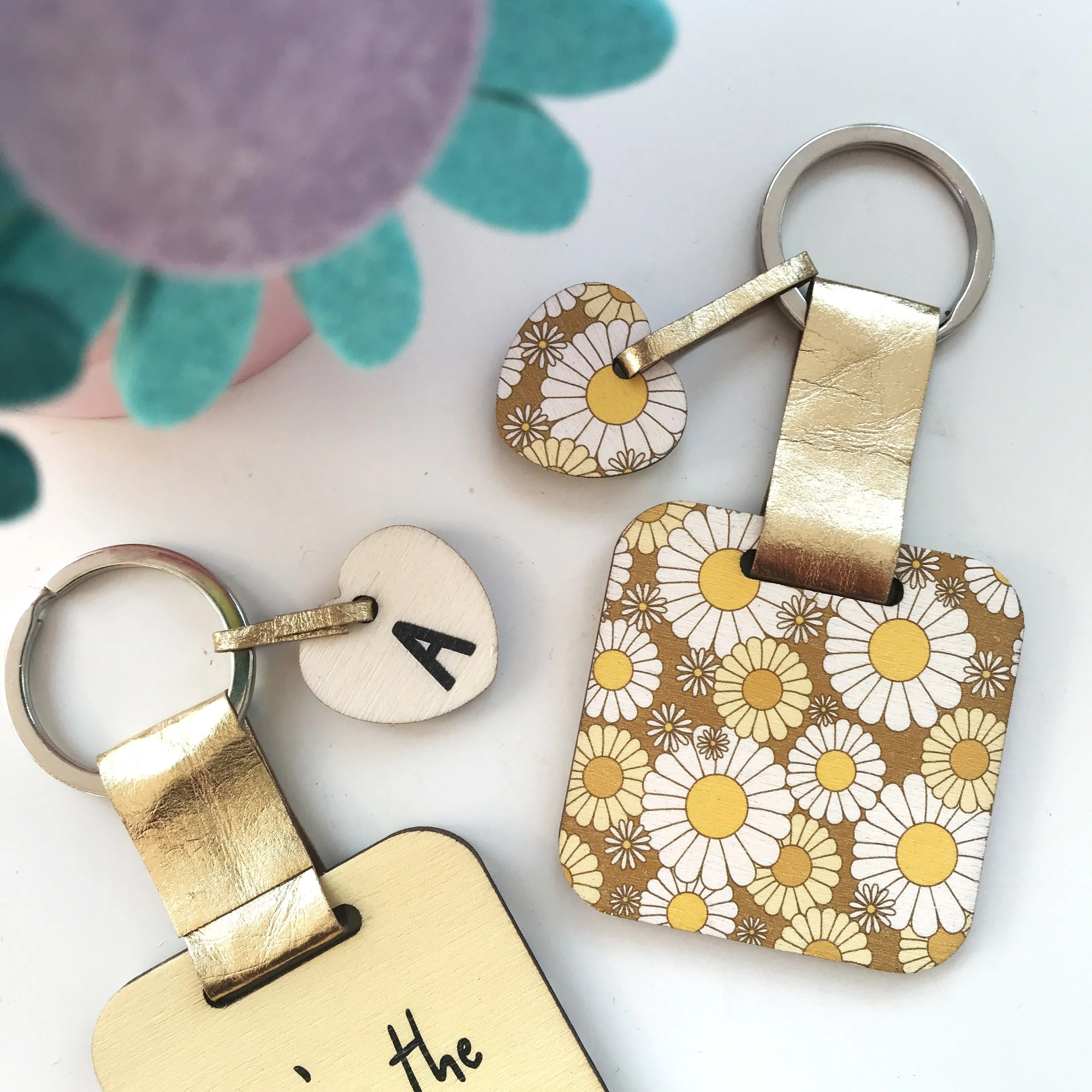 April flower keyring with intial charm.JPG
