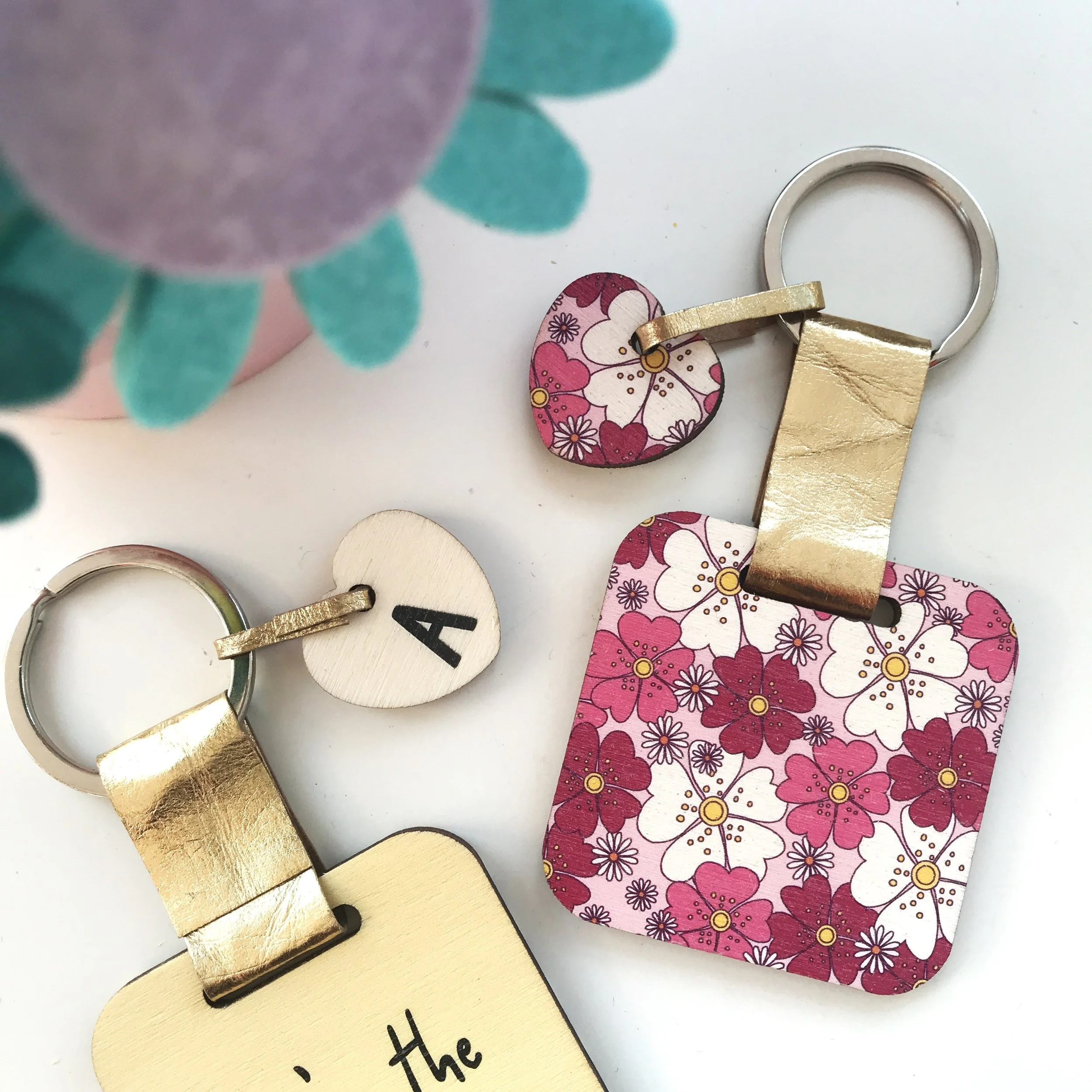 June flower keyring with intial charm.JPG