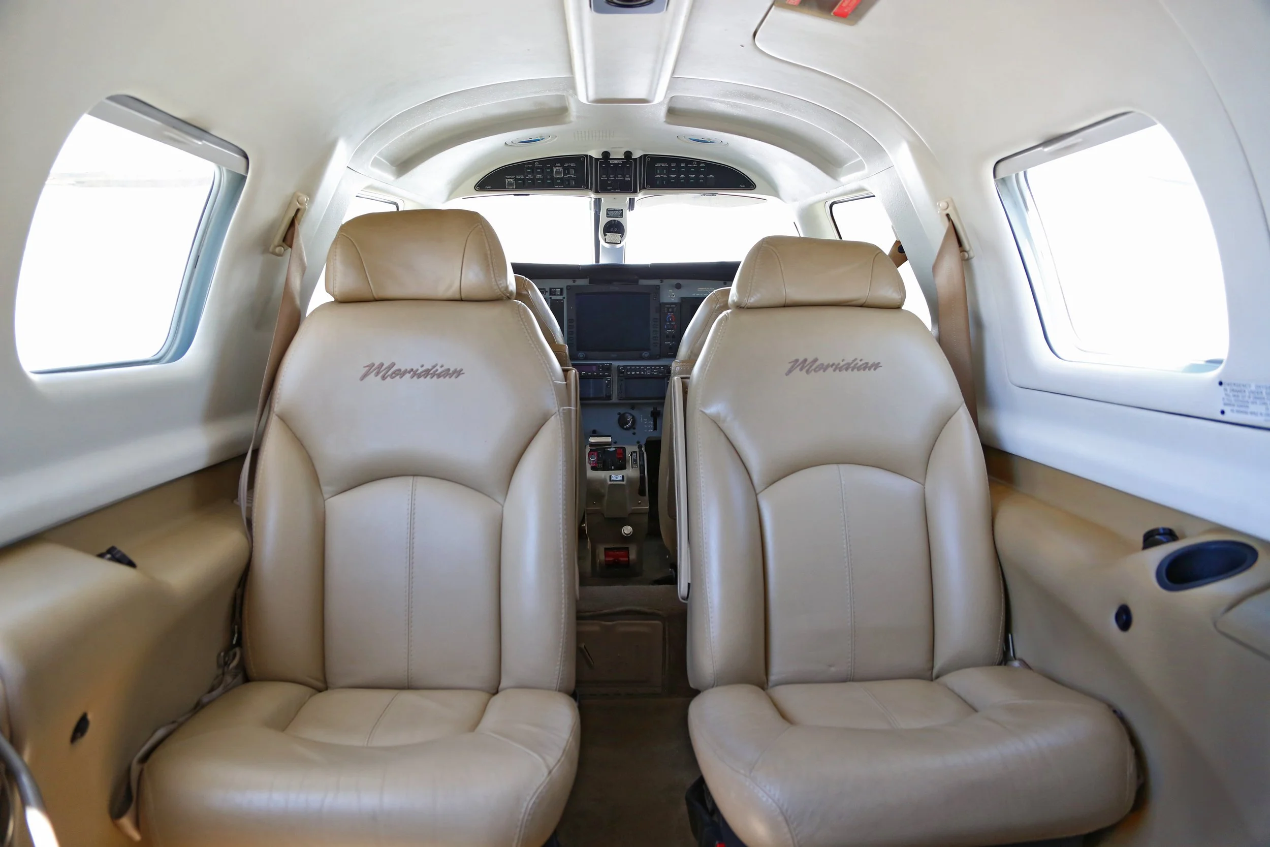 2008 PIPER MERIDIAN N724HA INTERIOR SEATS FACING AFT.jpg
