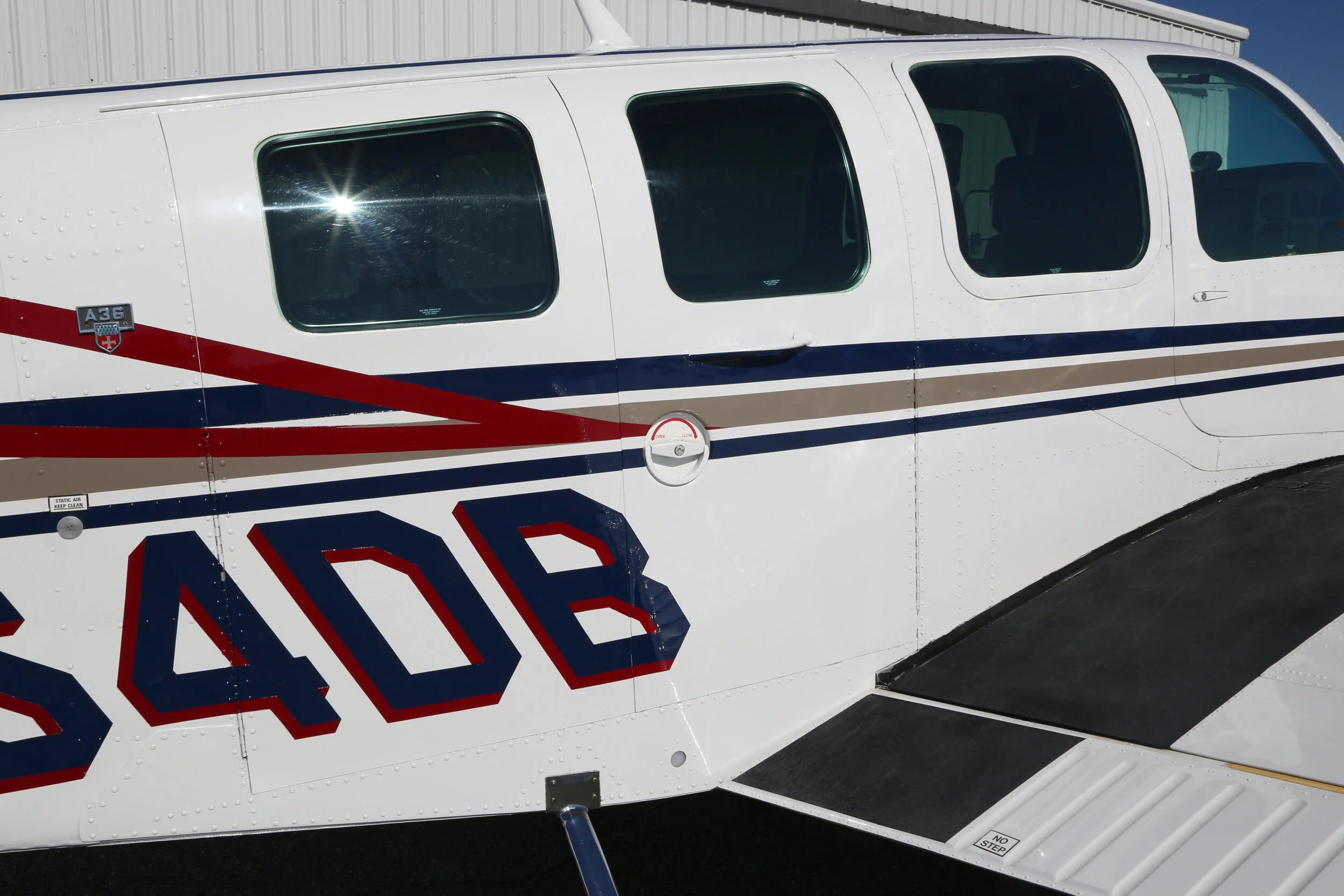 1978 A36 Bonanza Passenger Doors, wing steps.jpg