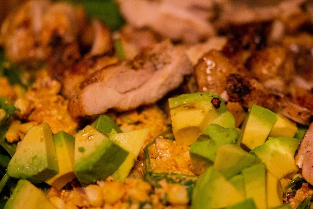 Summertime means Corn!!! Another one of our absolute favorite ingredients - and ,once roasted, perfectly paired in a salad with avocado and grilled chicken.  Served with a cold beer on a hot day?  We'll have it everyyyyyyday!

Summer Corn, Chicken, a