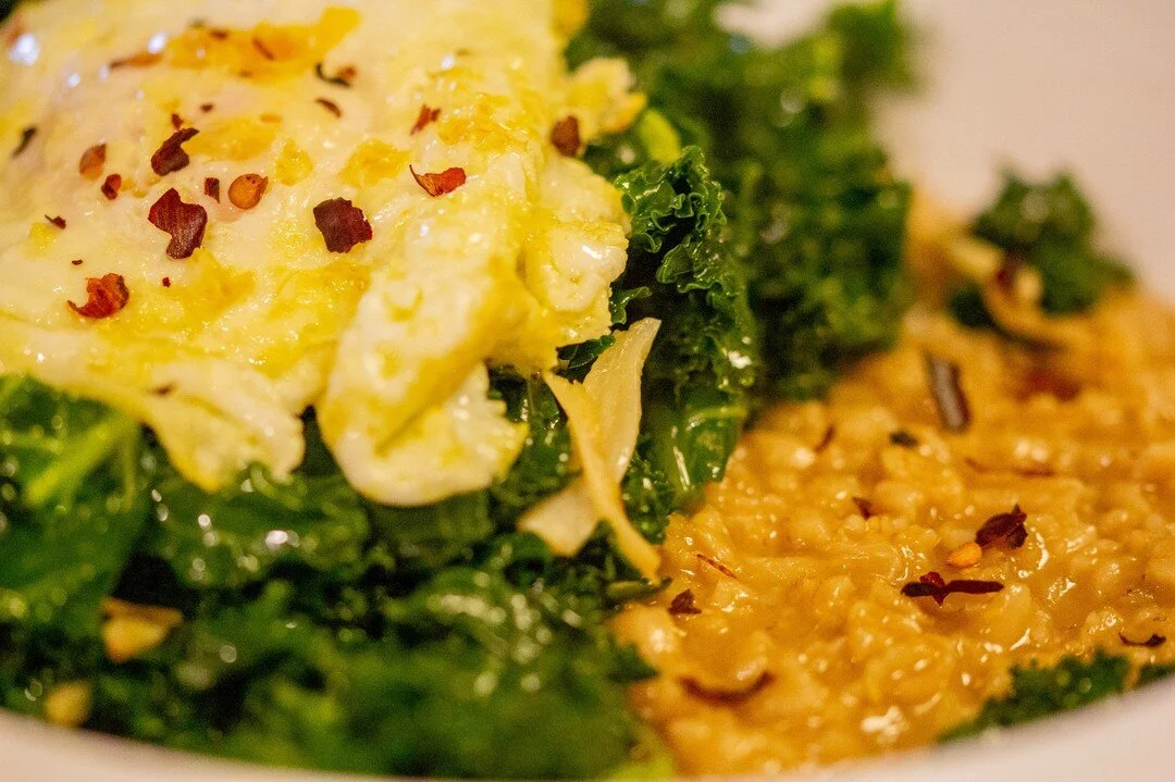 Finding something fun, simple, healthy(ish), and different for breakfast day after day can be a challenge.  We were delighted when we stumbled across this recipe for savory oatmeal with sticky garlic kale and a fried egg.  Making savory oatmeal never