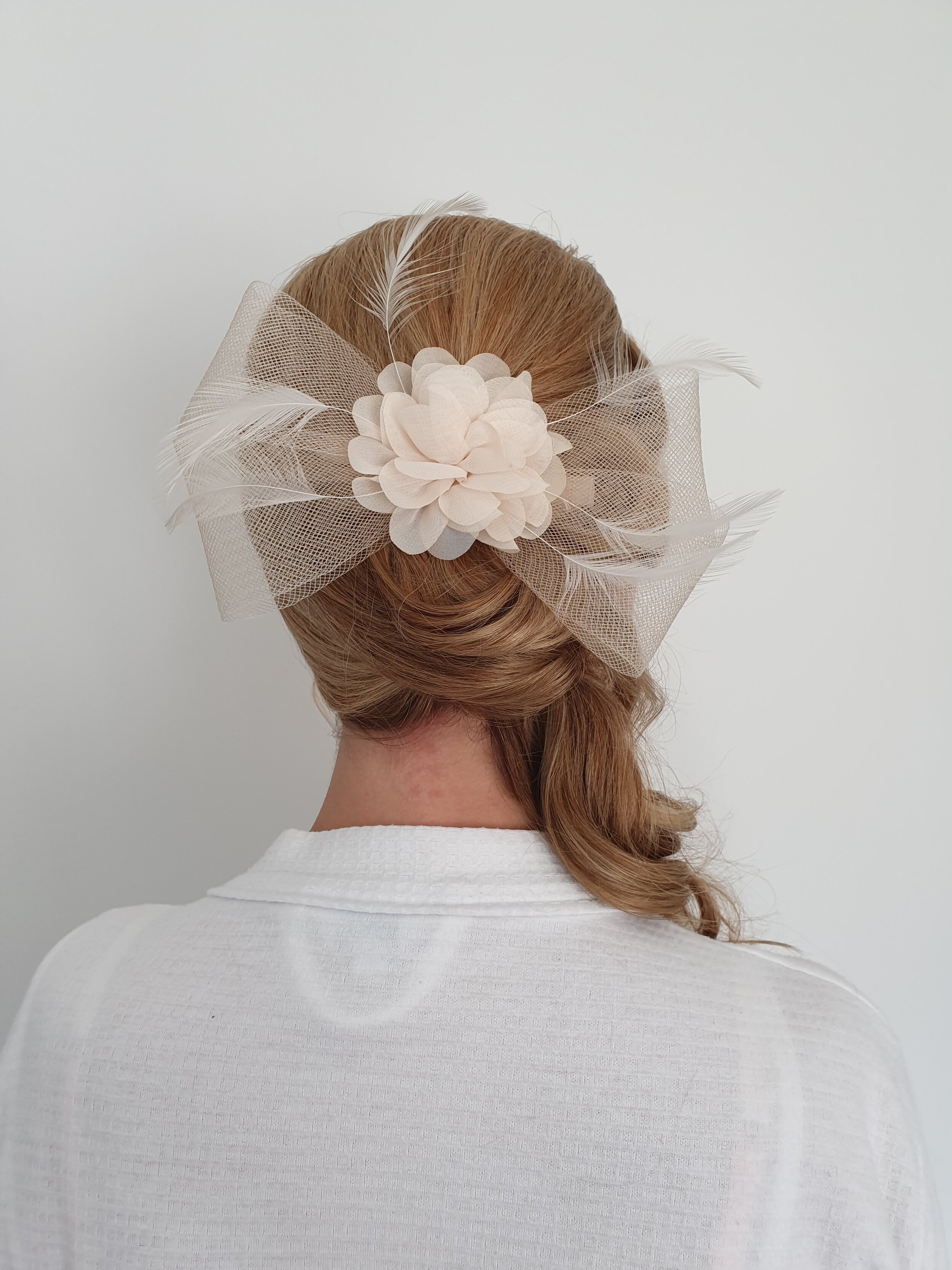 wedding guest facilitator hair up  