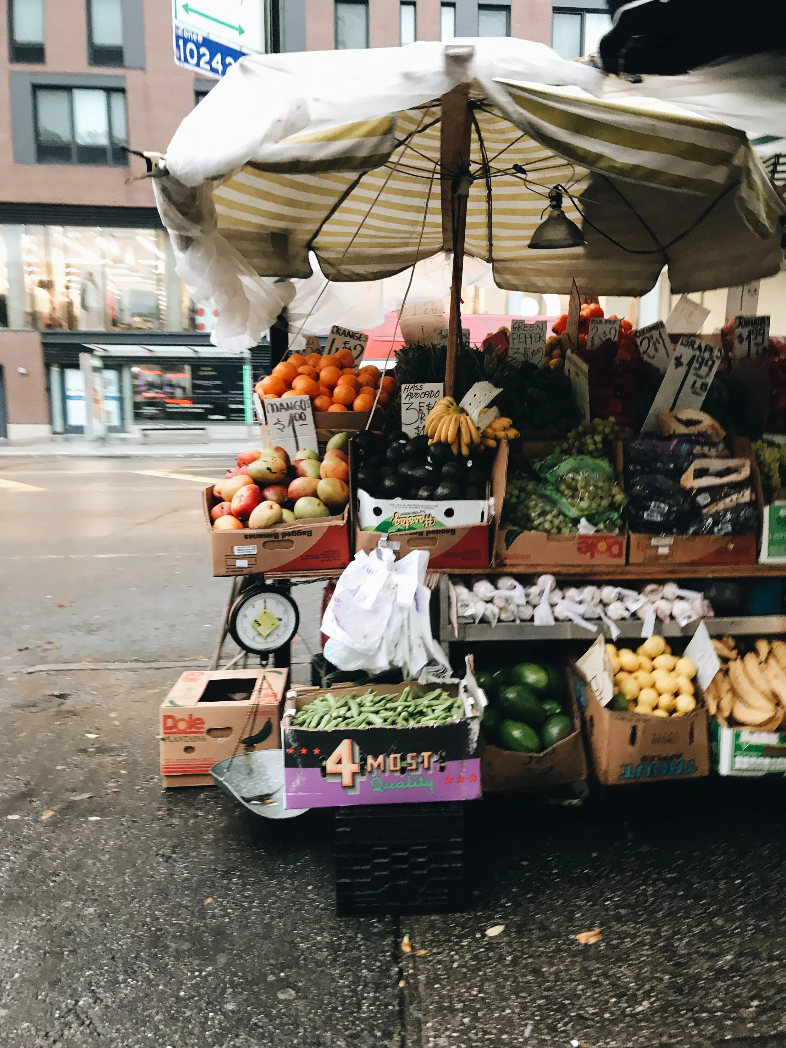 A Lower East Side produce vendor sets up shop in the rain across the street from the controversial Trader Joe’s -Target complex. Photo by Alexandria Misch for Canal Street News
