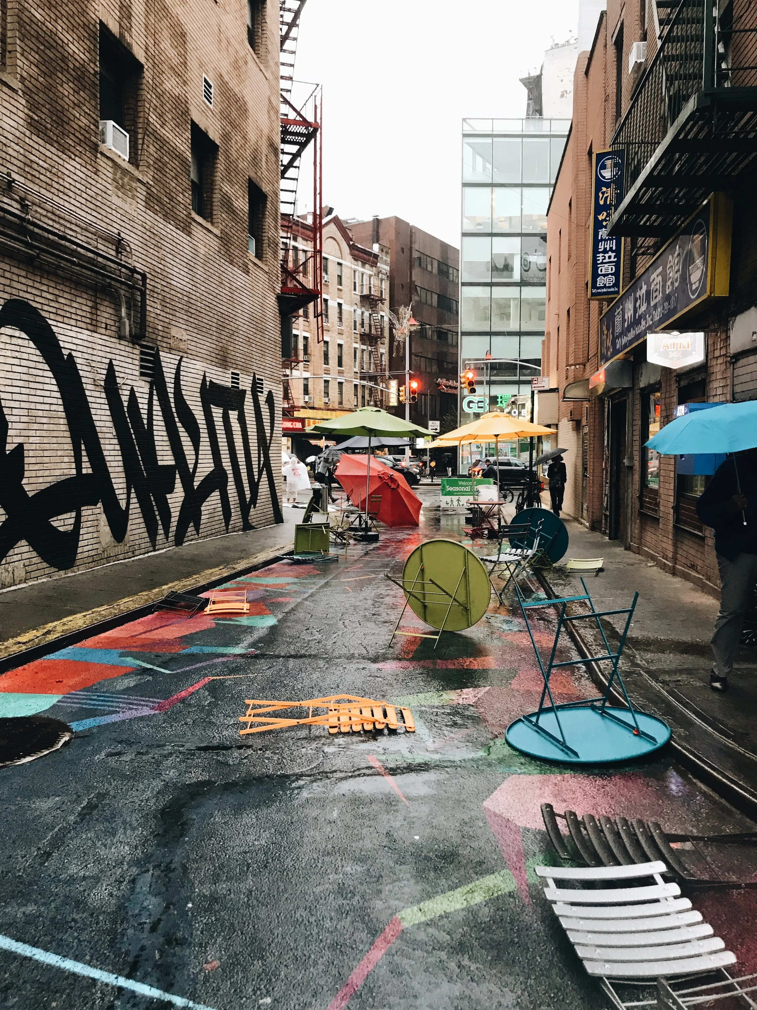 Doyers Street, home to some of Chinatown’s most colorful street, art during a storm. Photo by Alexandria Misch for Canal Street News