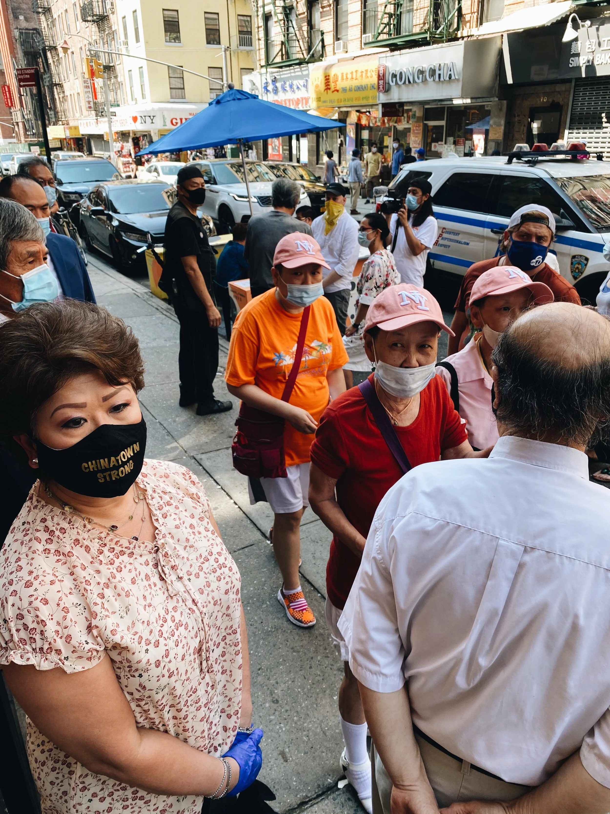 Local advocates advertise the message of “Chinatown strong” while calling on City Hall for help. Photo by Alexandria Misch for Canal Street News
