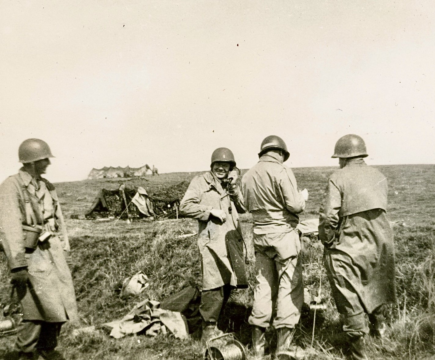 1st Lt. Marvin Ragland (with field phone) - artillery training in Wales, 1944