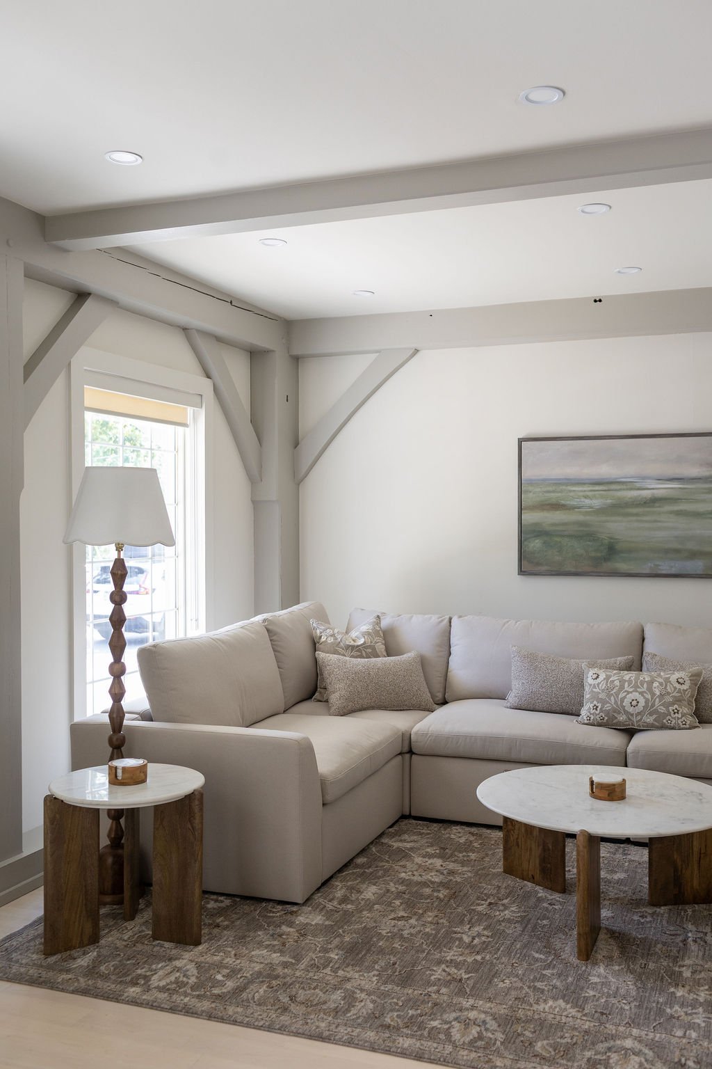 Cozy taupe sectional sofa nestled in the living room of The Ayrshire Laigh property