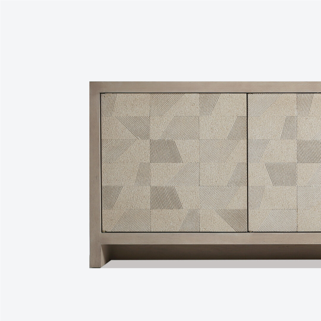 Heavily grained oak is joined traditionally to frame a mosaic patchwork of geometric forms, expressed in rugged Sinai Pearl Marble. A combination of concealed push to open and brass hardware keep the natural expression true while the three board cons