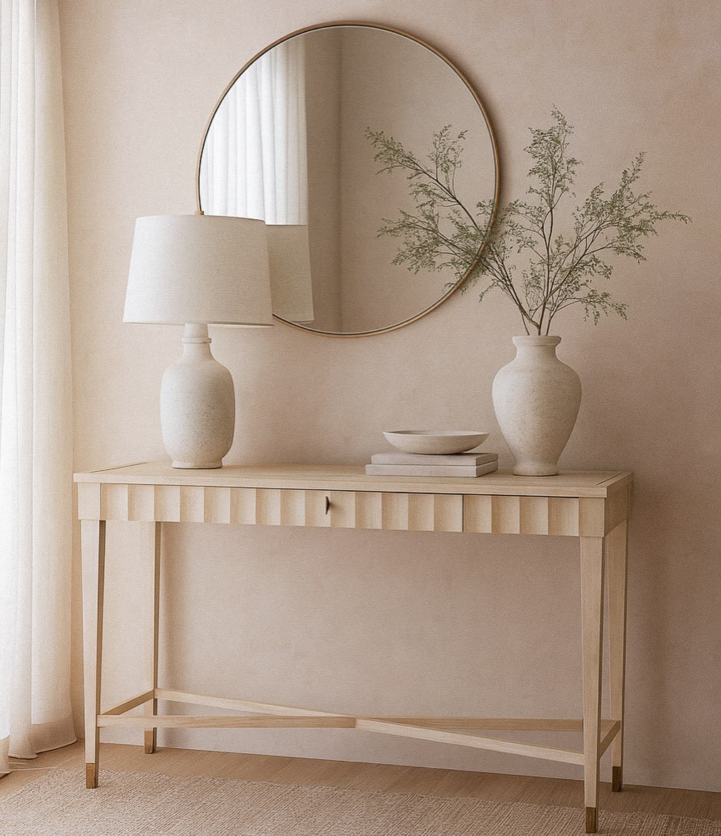 Soft geometry, quiet presence. The Antille Console Table brings subtle rhythm through its sculpted apron and light, airy silhouette&mdash;an effortless anchor for entryways, halls, or living spaces. Styled simply or layered with objects you love, it&