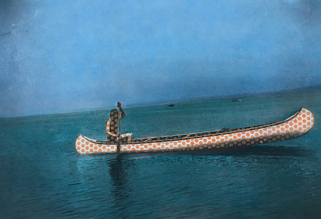  A figure in a canoe. Overlaid over the figure and canoe are red dots. 