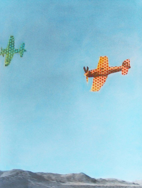  Two planes in the sky, one overlaid with orange dots and the other with green. 