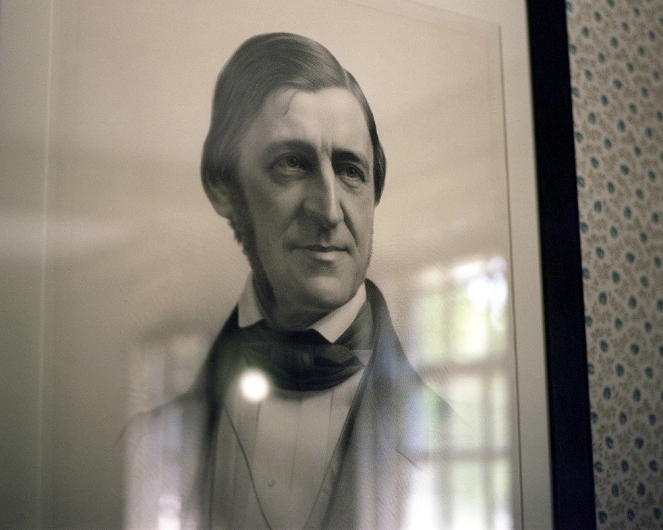  A framed portrait of a man. 