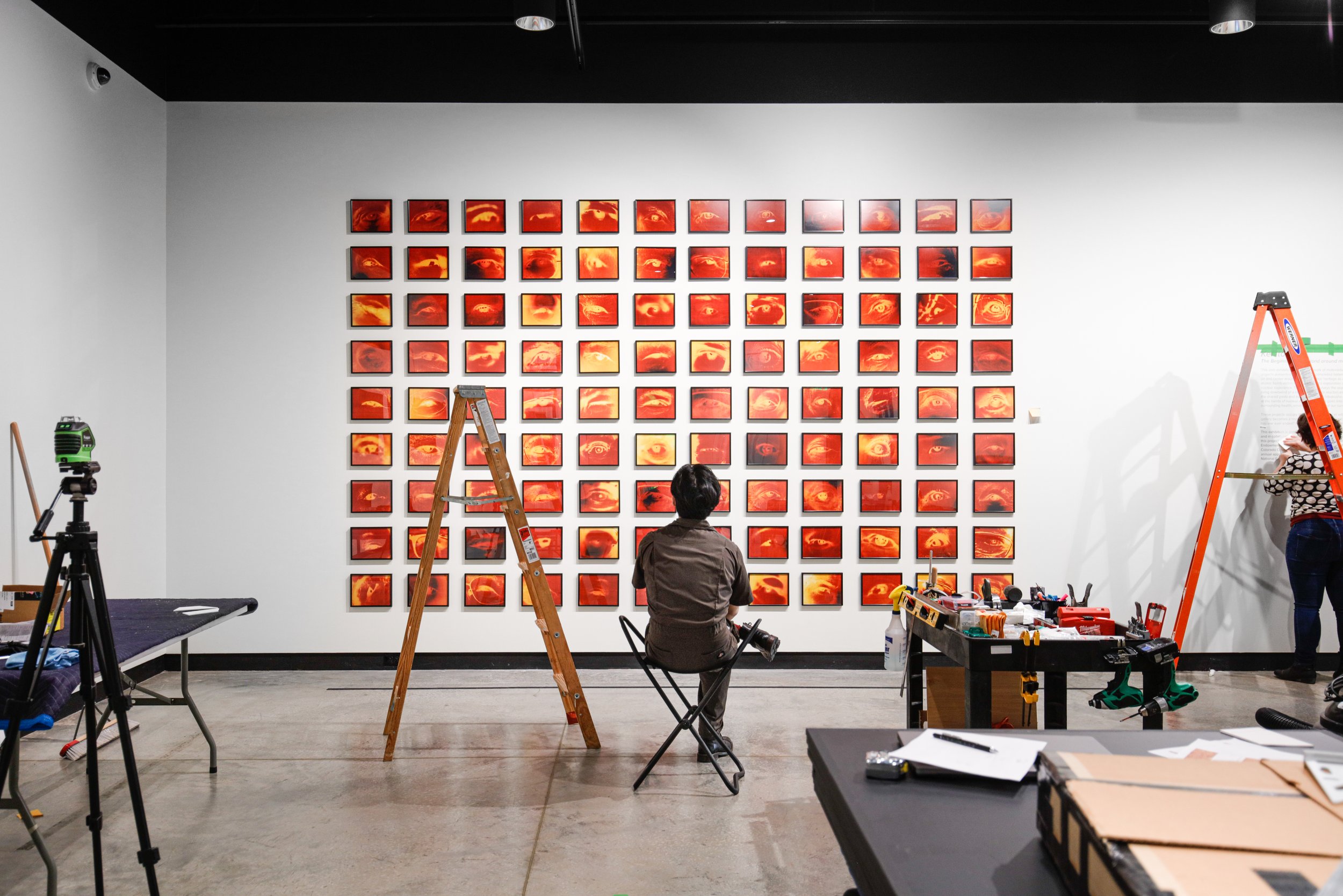  Artist Kei Ito sits in front of the freshly installed “Eye Who Witnessed” grid. 