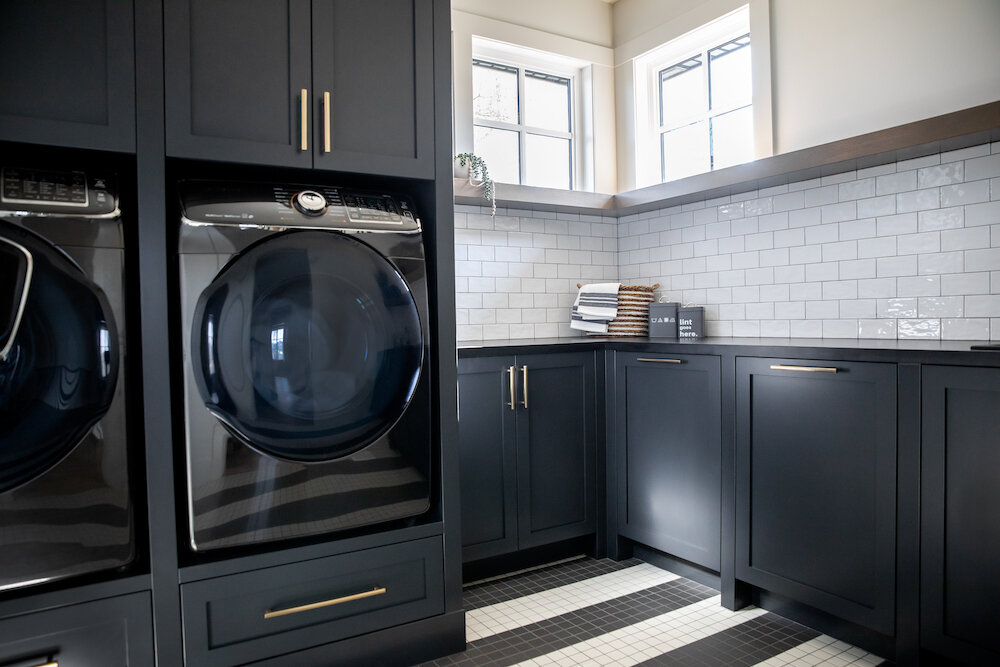 Veranda-Homes-Luxury-Builder-Altadore-Laundry-Room-Stripped-Floor-Black-Cabinets.jpg