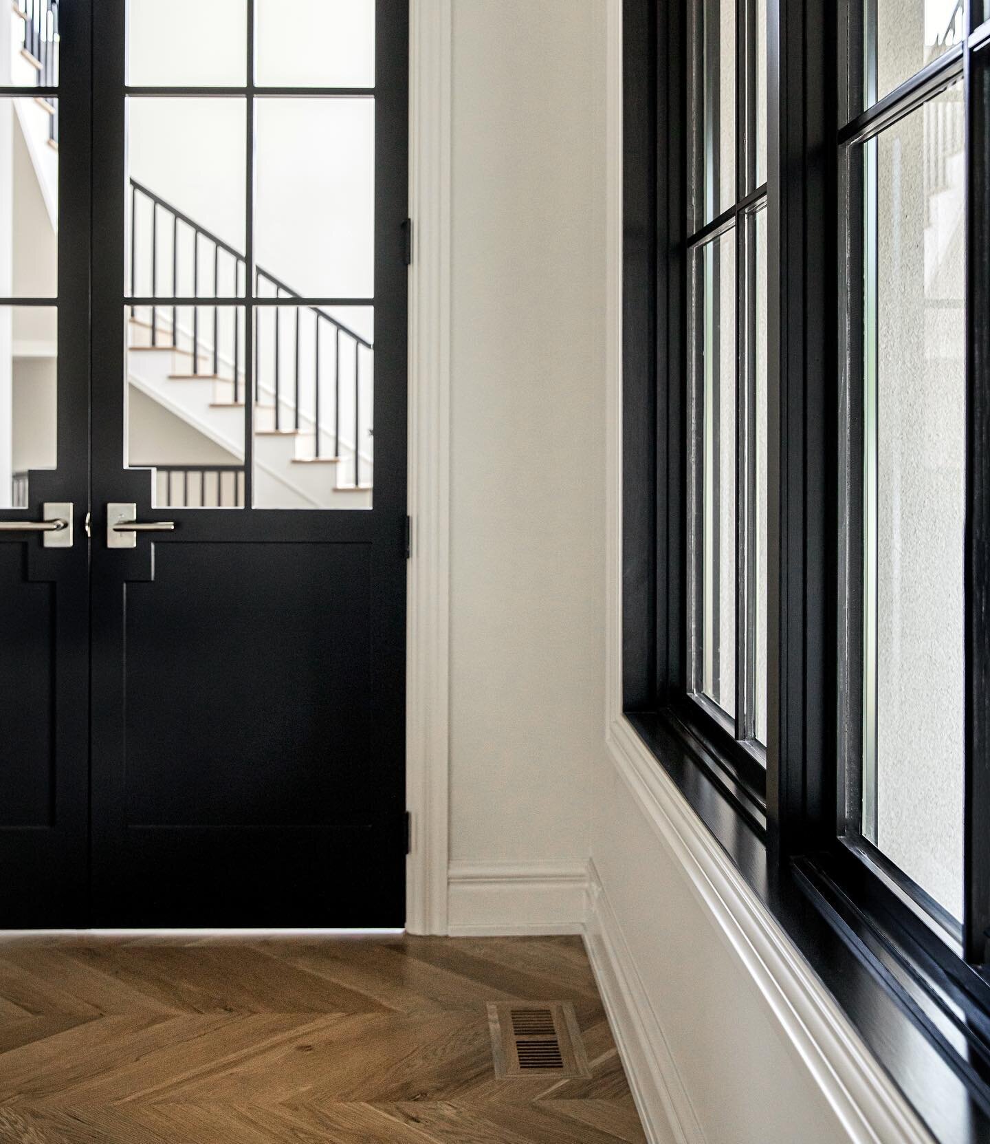 Little details that make all of the difference, a chevron pattern for the home office, the backplate detail on the French doors, and the stained wood windows, oh, and that black railing peeking through on the staircase. 
.
.
.
.
.
.
#chevronpattern #