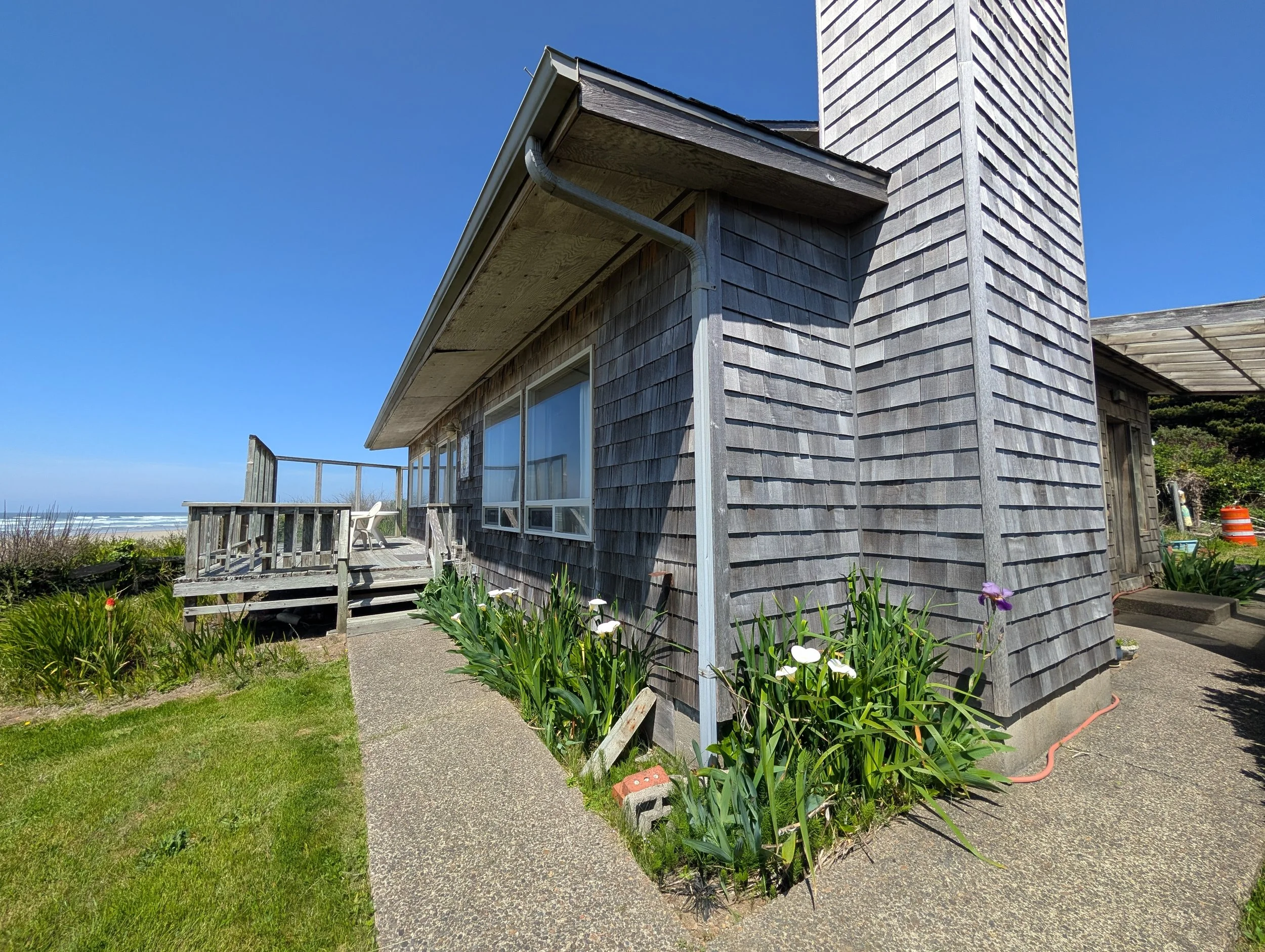 West side of building.

Optional entrance into kitchen/dining/living room from sliding glass doors.

(Image taken 5/8/2026)
